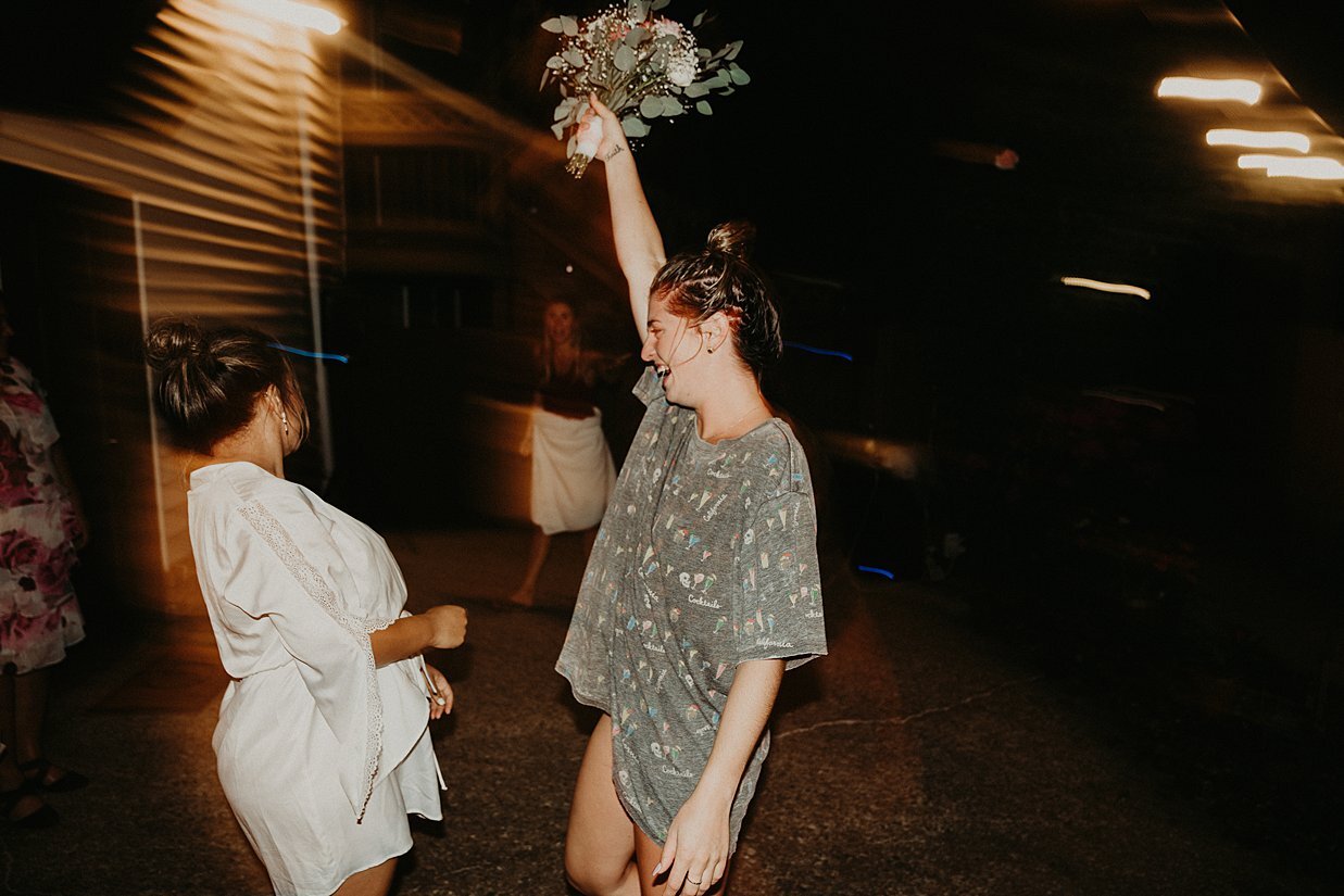  bridesmaid catches bouquet wearing pajamas 
