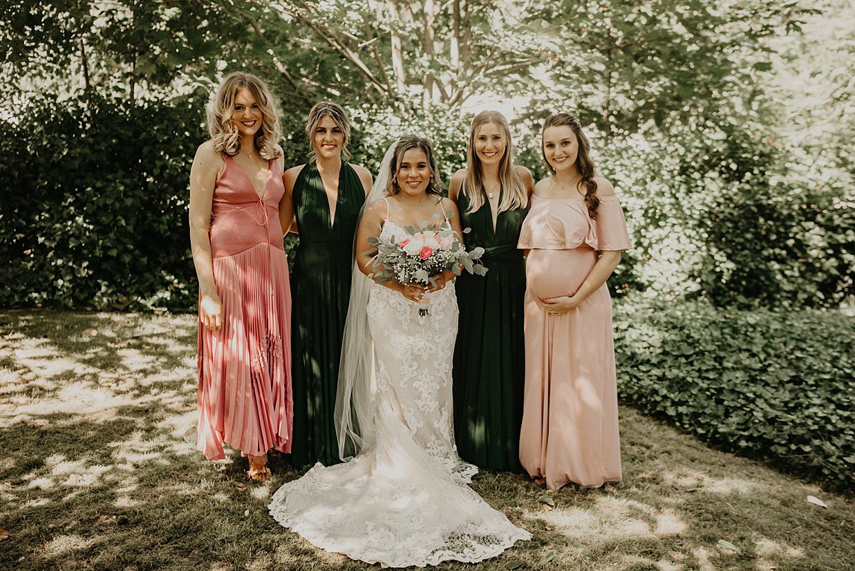  green and pink bridesmaids with brides at intimate backyard wedding in Federal Way 