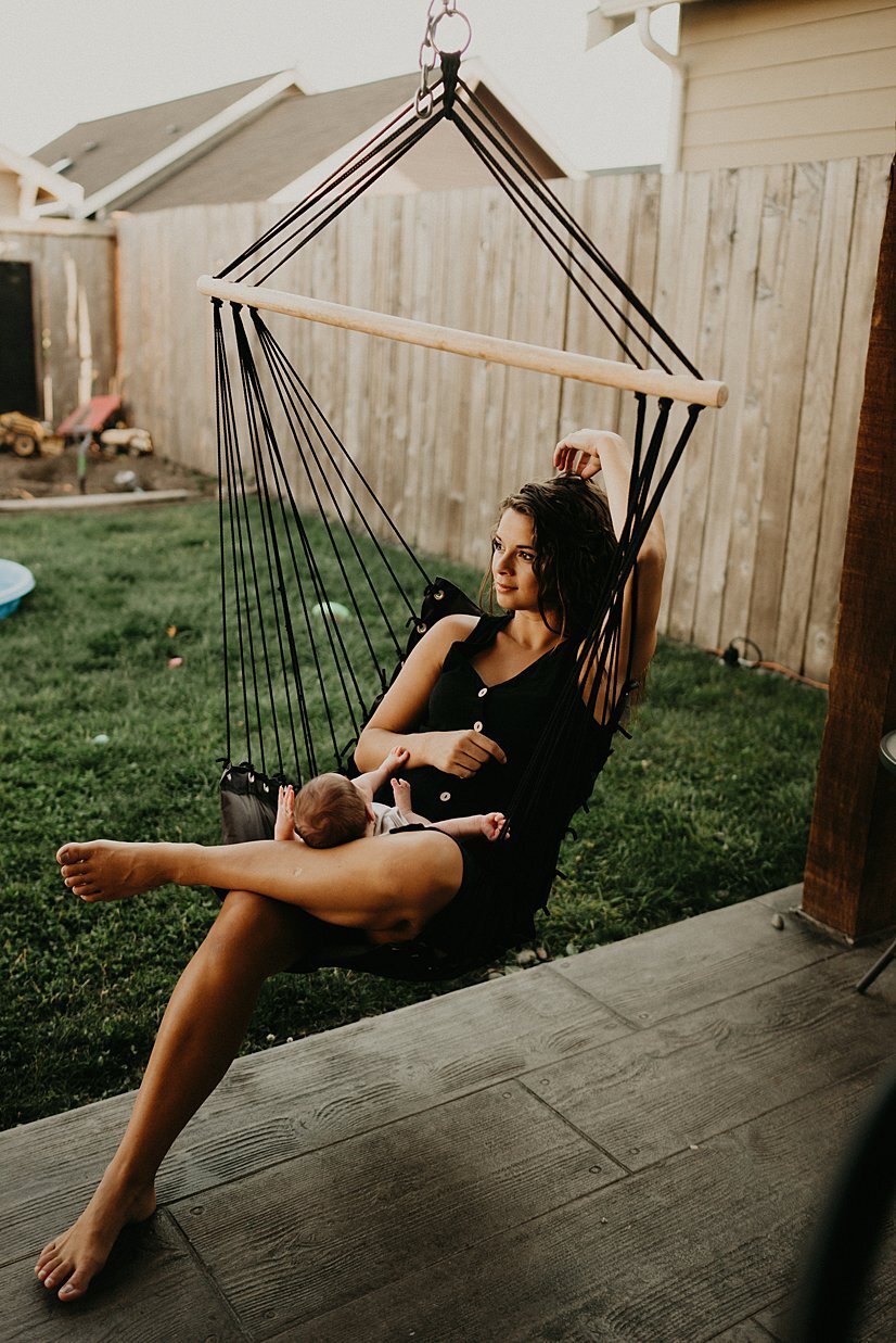  mama and baby in hammock during in home session 