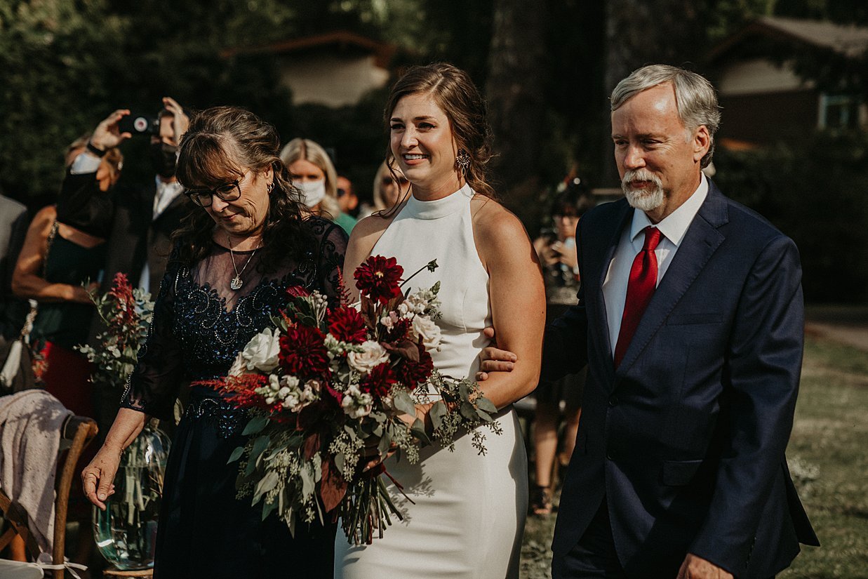  bride walking down aisle at alderbrook resort wedding 