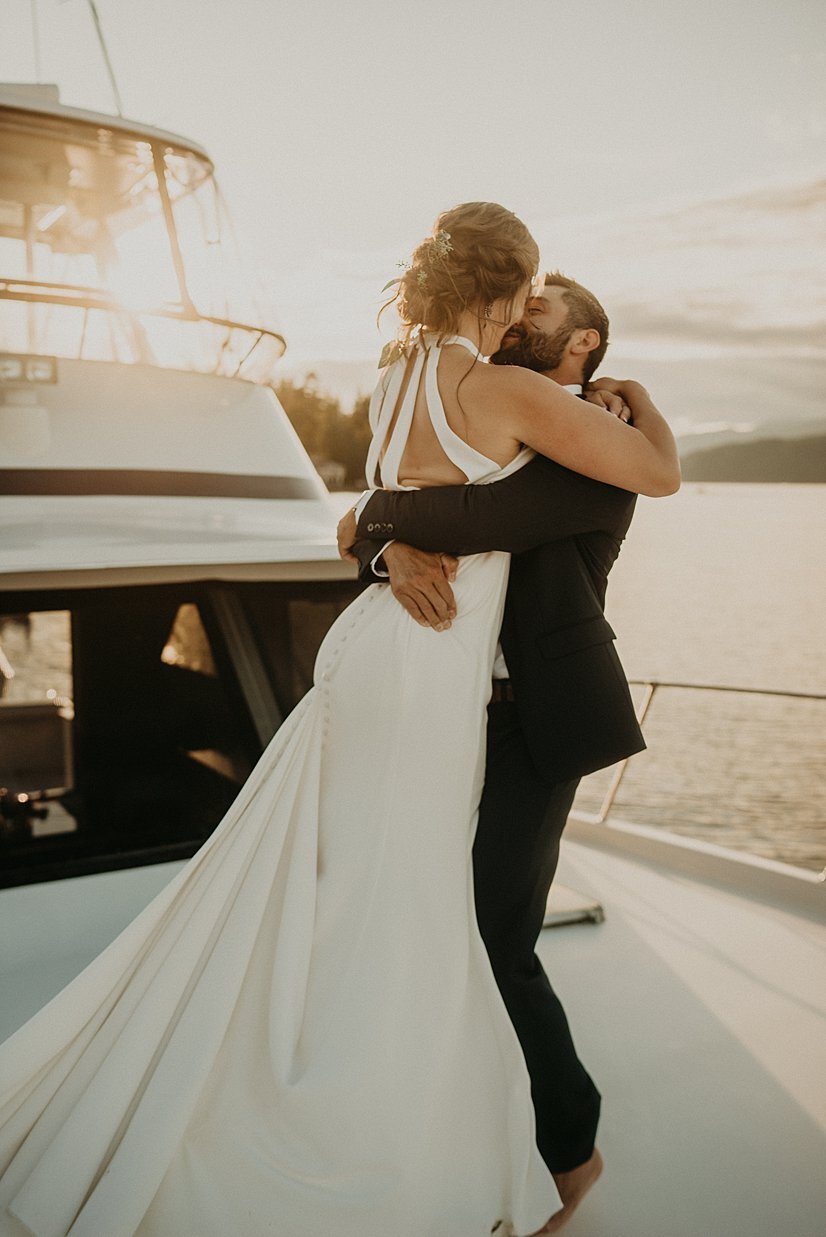  bride and groom on yacht in hood canal 