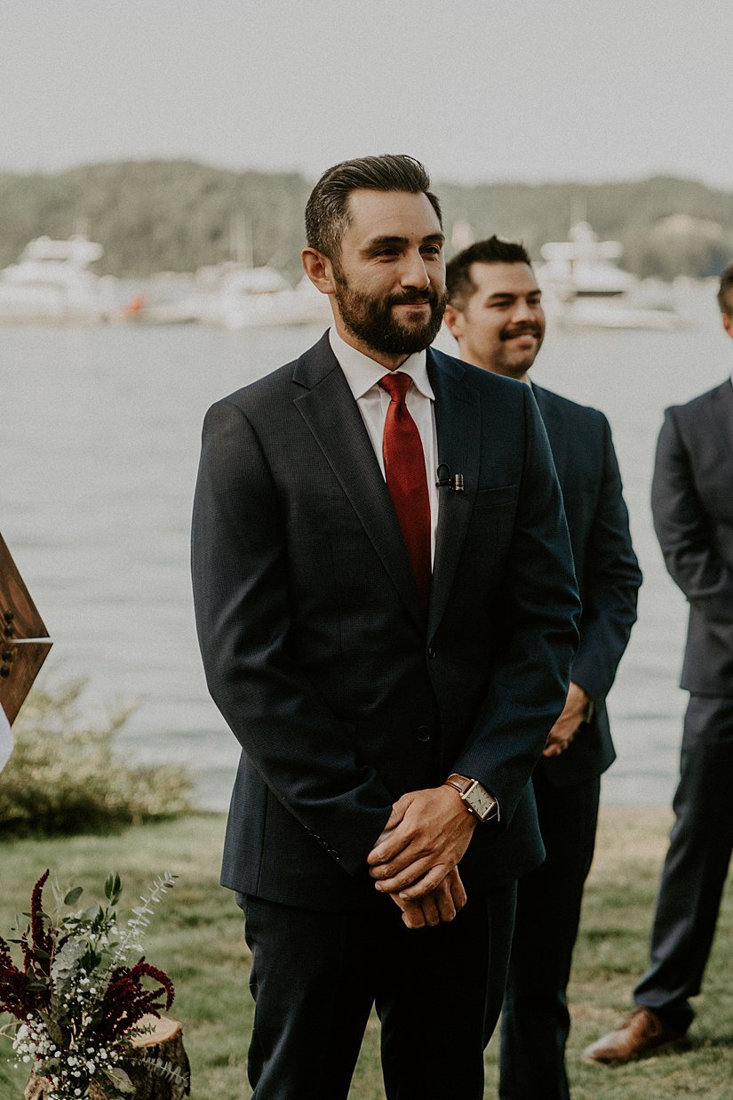  groom seeing bride for first time at alderbrook wedding in union, wa 