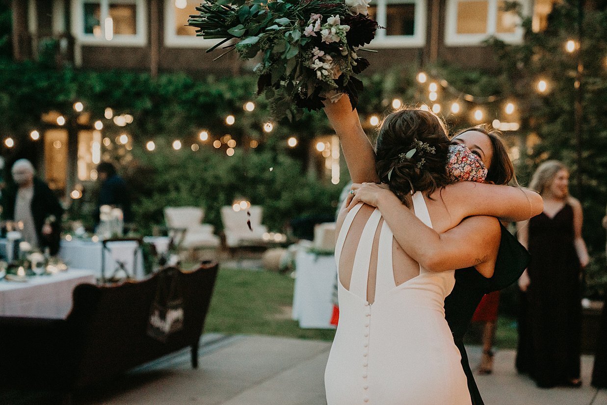  masked guest caught bouquet at wedding 