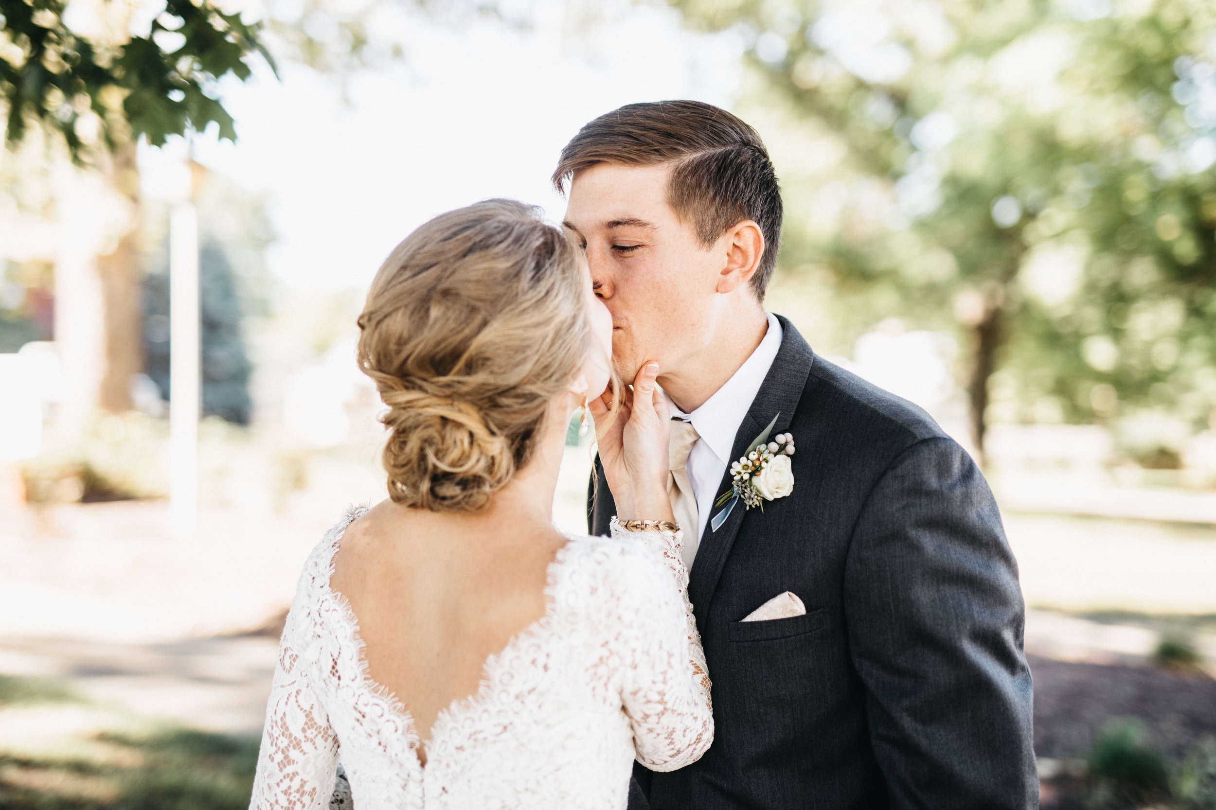 Groom's boutonniere in white