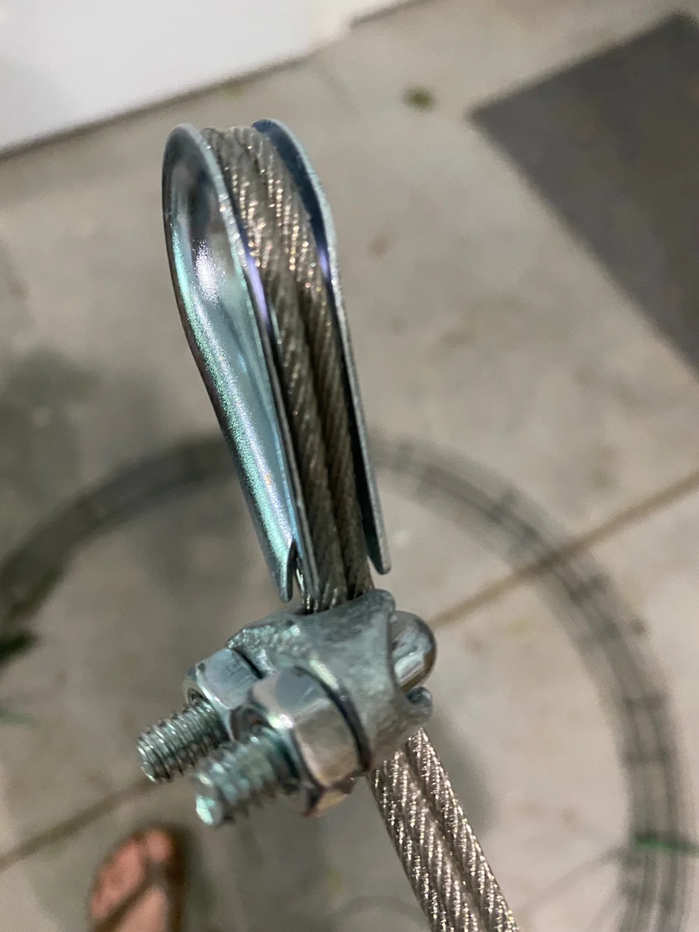 Cable saddle for hanging chandelier