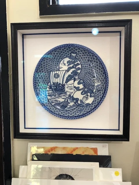 Seven signs of good fortune dish in shadow box with linen spacers and flex fabric fillets