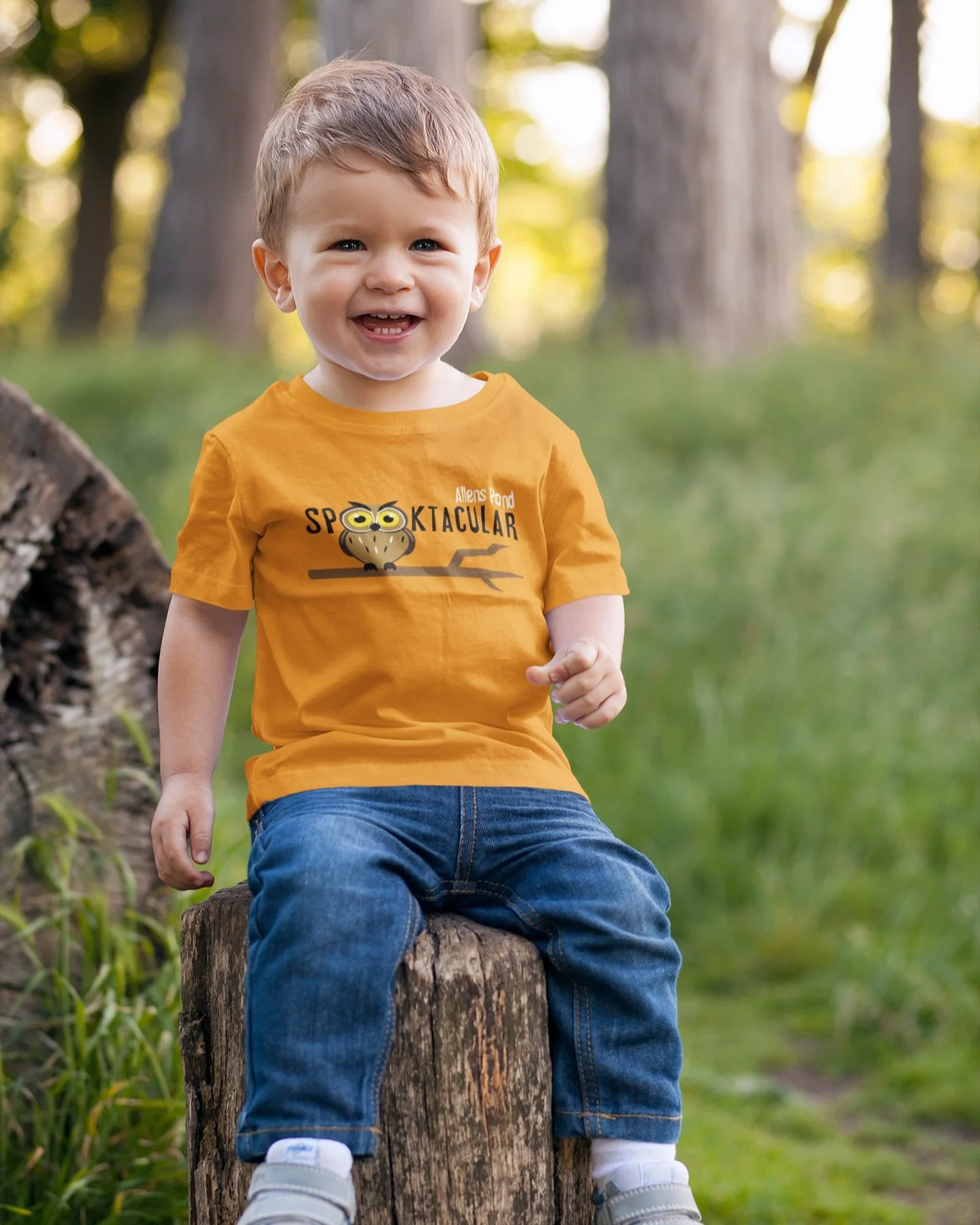 t-shirt-mockup-of-a-toddler-sitting-on-a-log-2911-el1.jpg