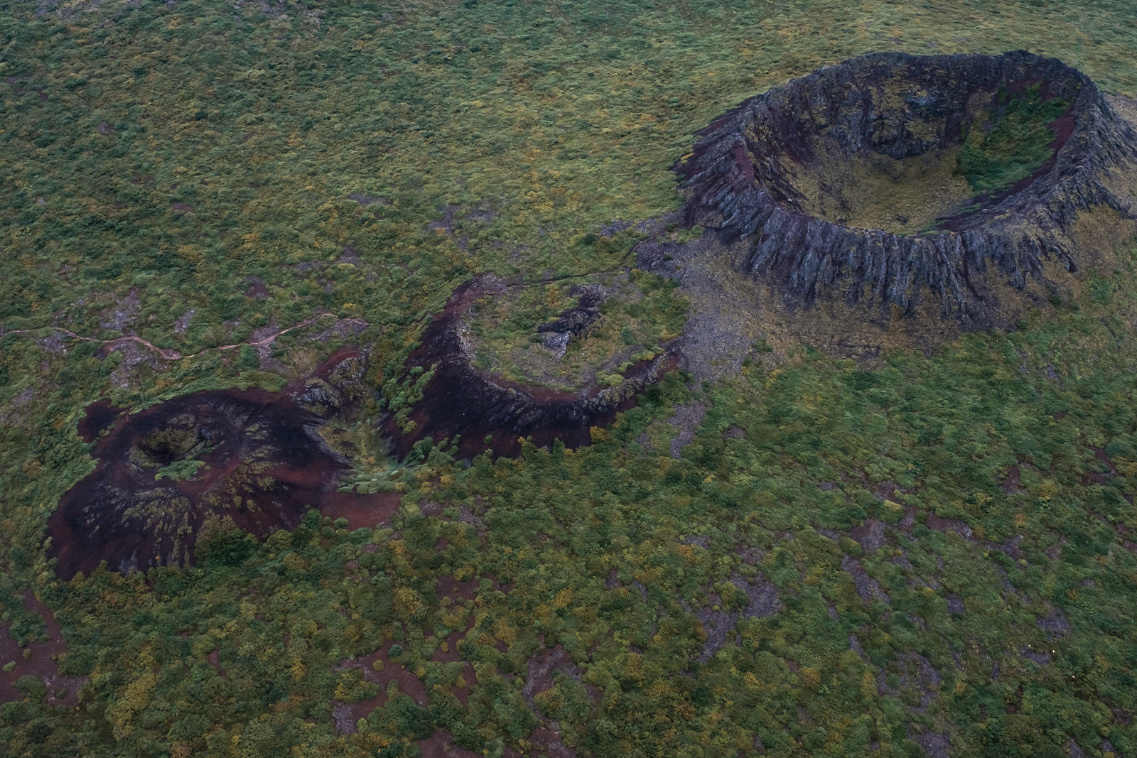 Dead volcanic craters, West Iceland. Aerial shot from small airplane. (XF 16-55mm f2.8 at 24mm 1/1000 f6.4 ISO640)