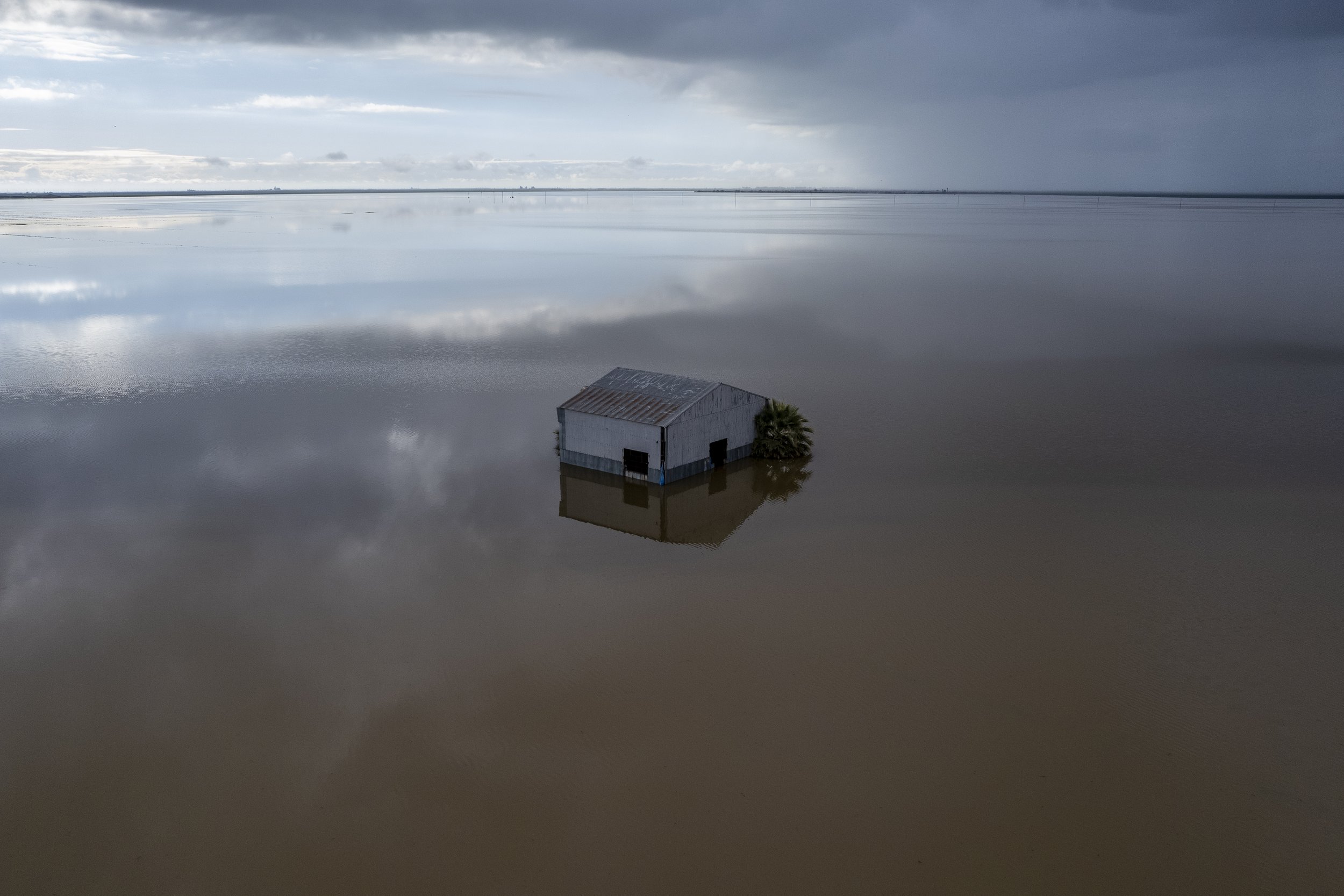  Flooded fields in Corcoran on Mar. 23, 2023. Photo by Martin do Nascimento, CalMatters 