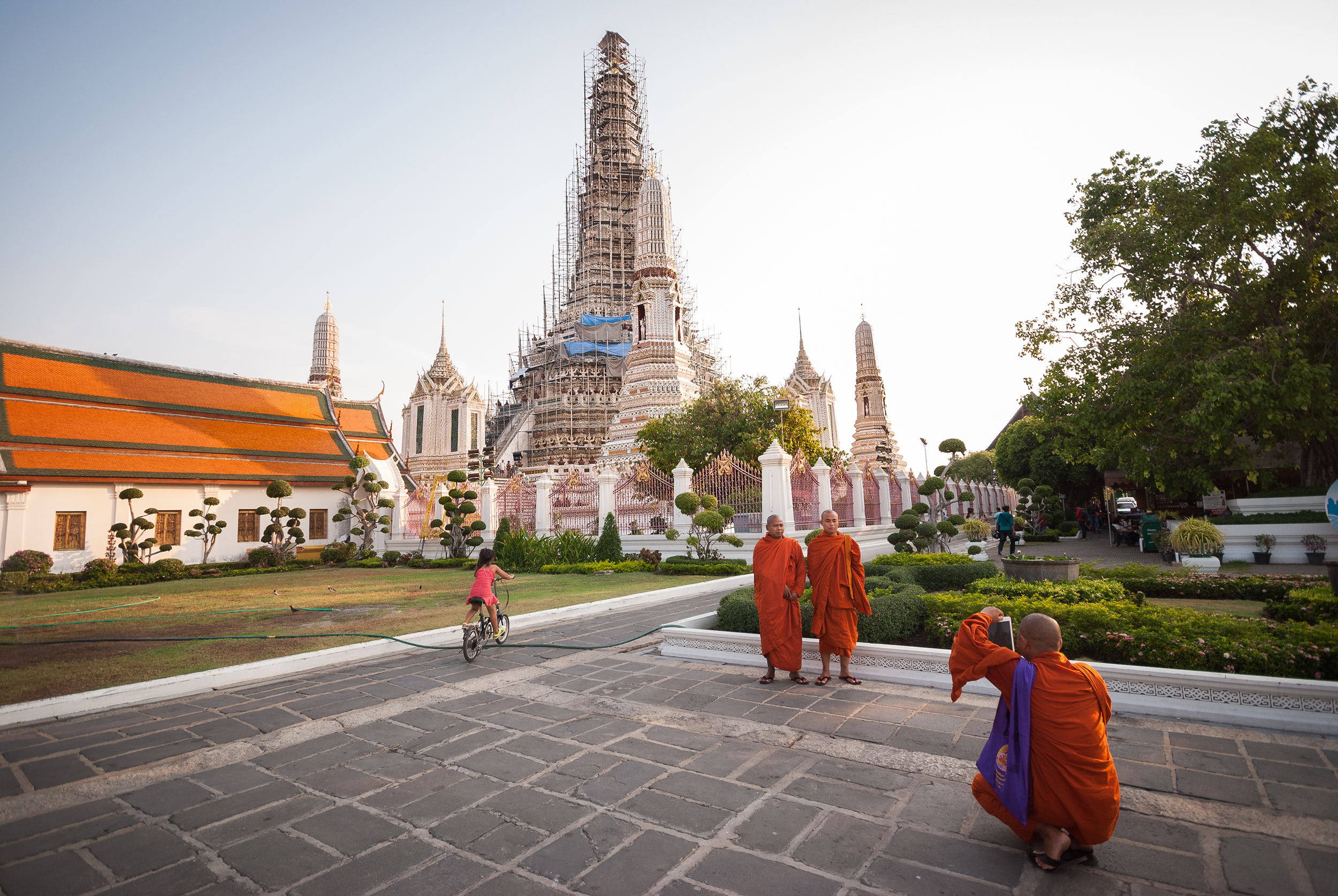 Monks having fun at Wat Arun (Temple of Dawn), Thailand