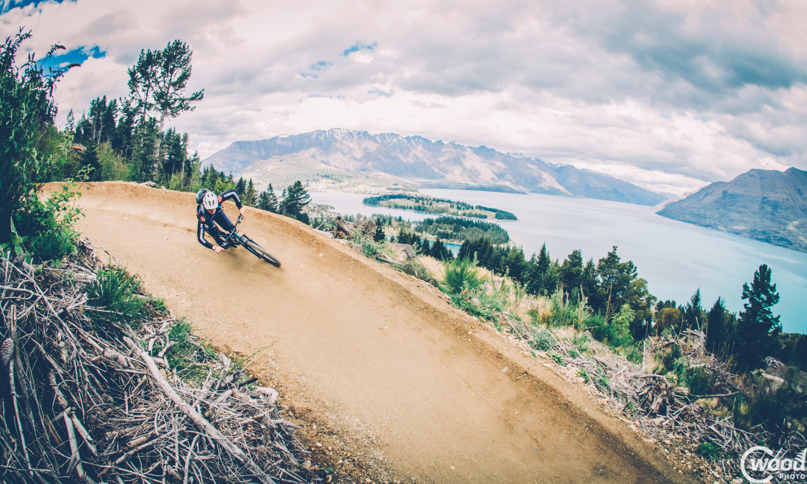 Queenstown rider Tim Ceci takes on one  of the most scenic MTB corners in the world ­ on Queenstown Bike Park¹s Thundergoat trail. Photo by Callum Wood