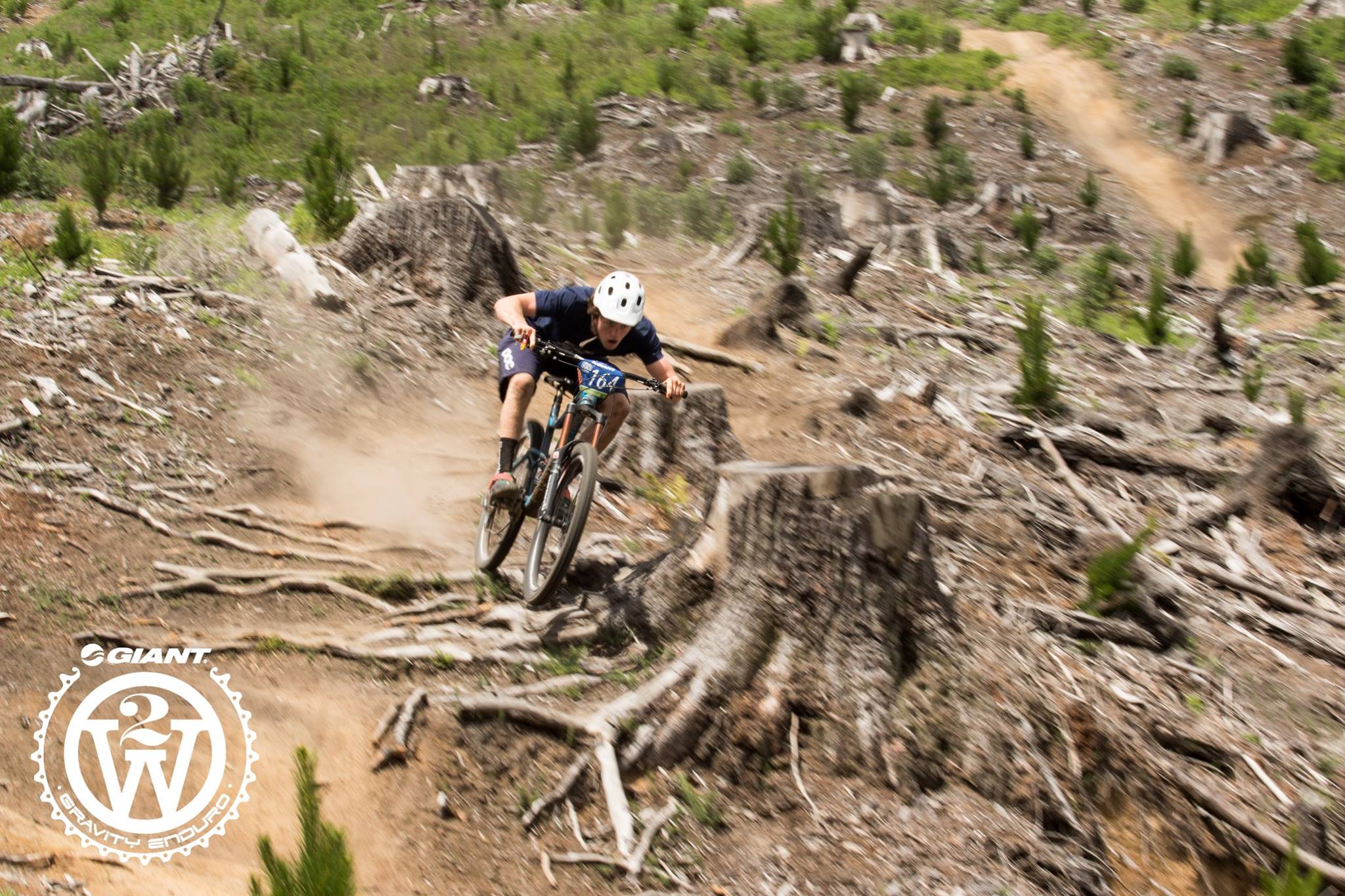 Keegan Wright taking a fast line over some roots on Boulderdash Trail.