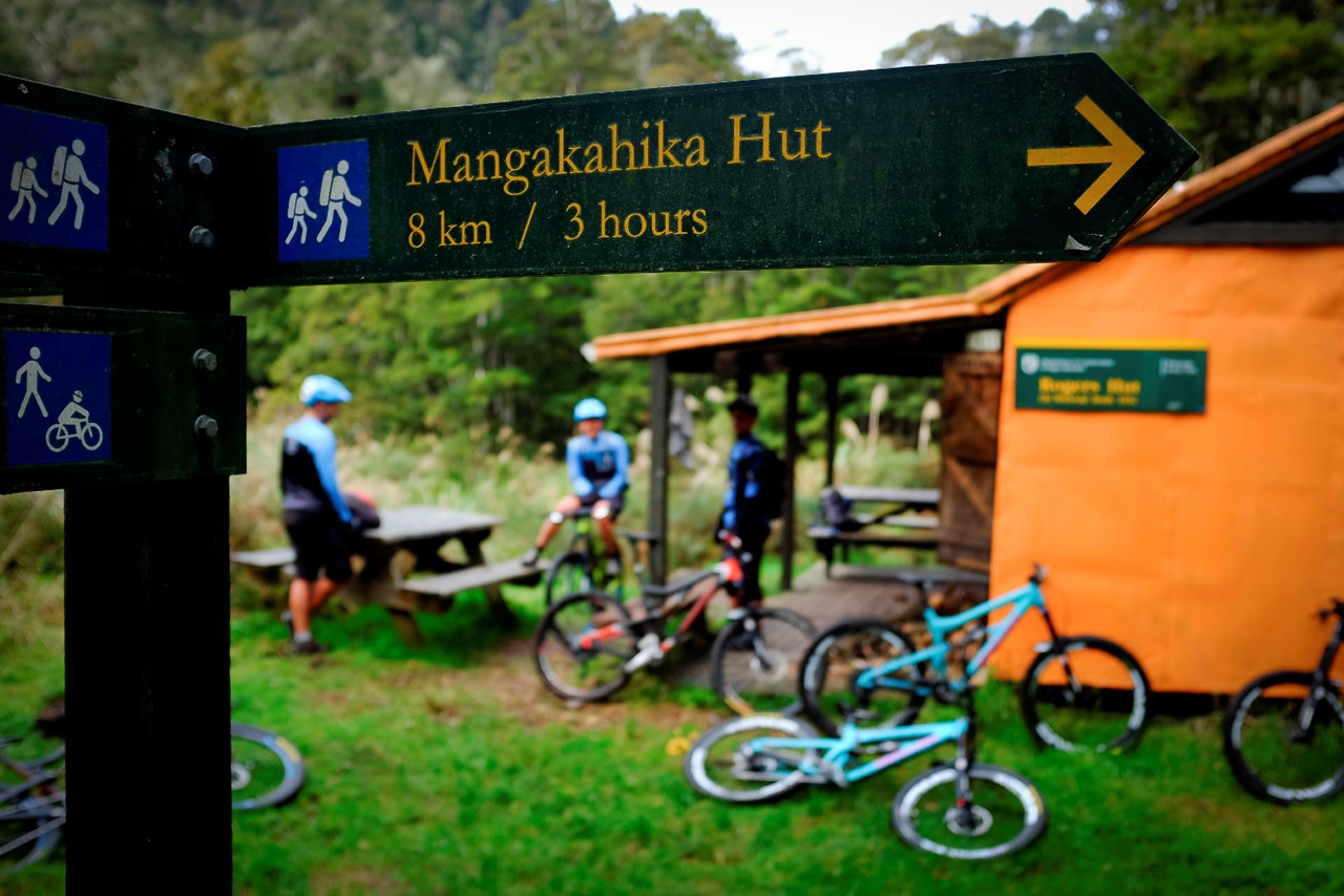 The orange-coloured Roger's Hut is a welcome relief to replenish energy on the remote Moerangi Track, Bay of Plenty. Photo: Nick Lambert