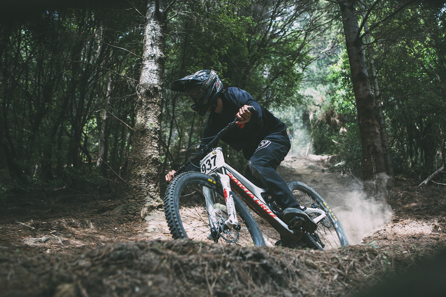 Jacob O'Donoghue-Price buries his Santa Cruz into one of the final berms, lower 'Tim's Track'.