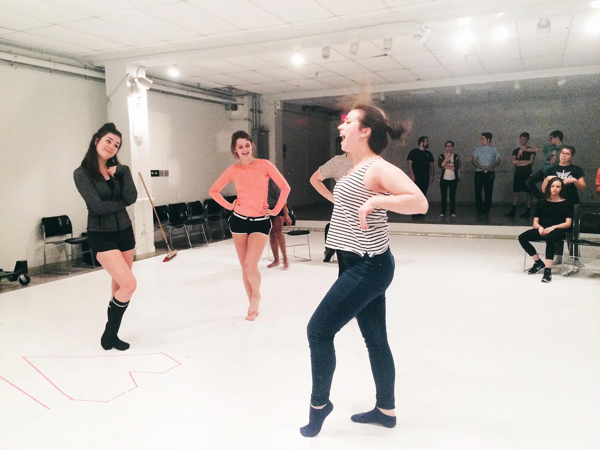 The cast practicing the bend and snap.