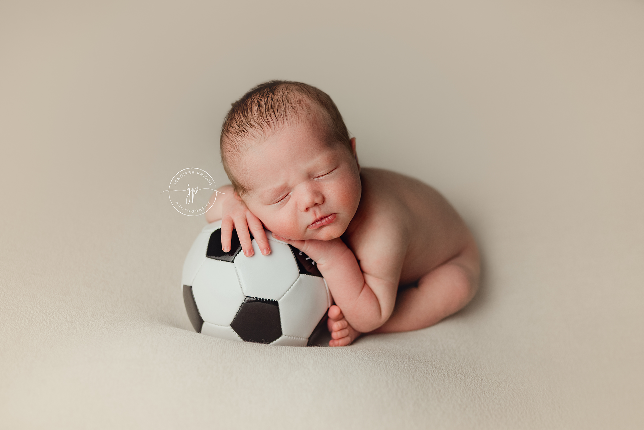 Newborn with Soccer Ball