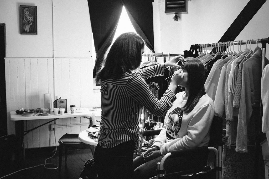 Ally getting her makeup done. 