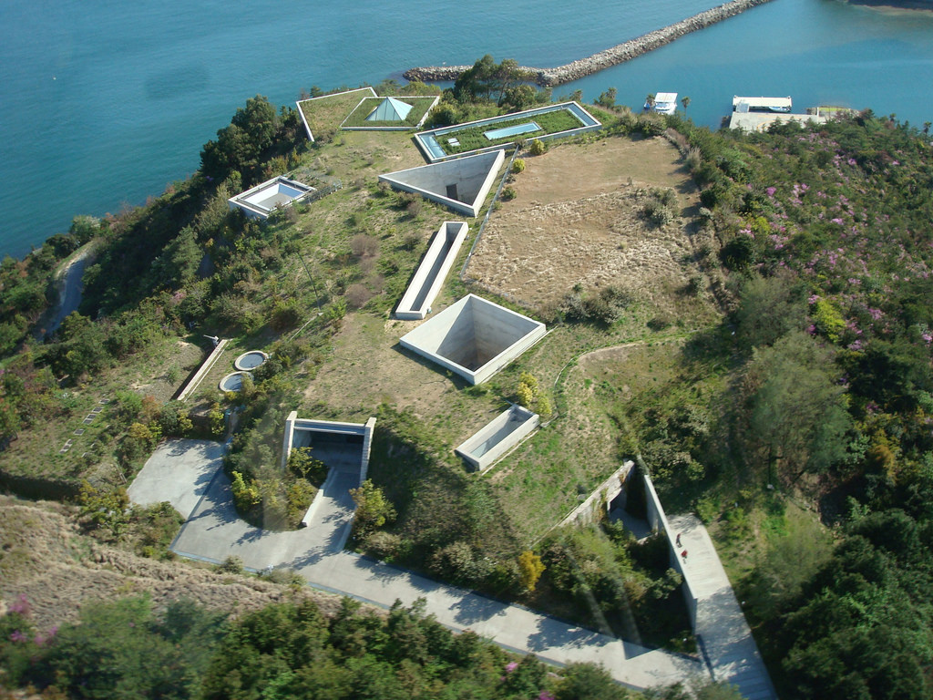 Aerial shot of the Chichu Museum from above, courtesy of Architizer .