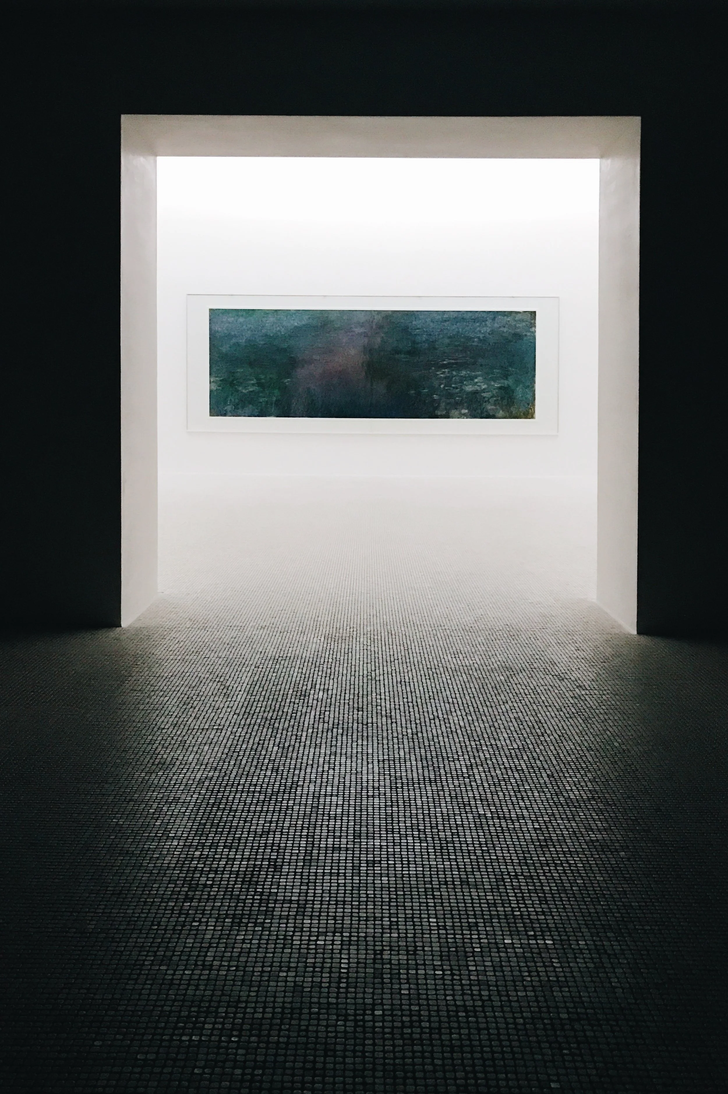 The outside rim of the Monet exhibition was exposed to sunlight (and thus illuminated the artwork on the walls), while the ceiling directly above us was made of concrete. We weren't allowed to take photos in the exhibition, but I couldn't help but sneak one in on my phone!