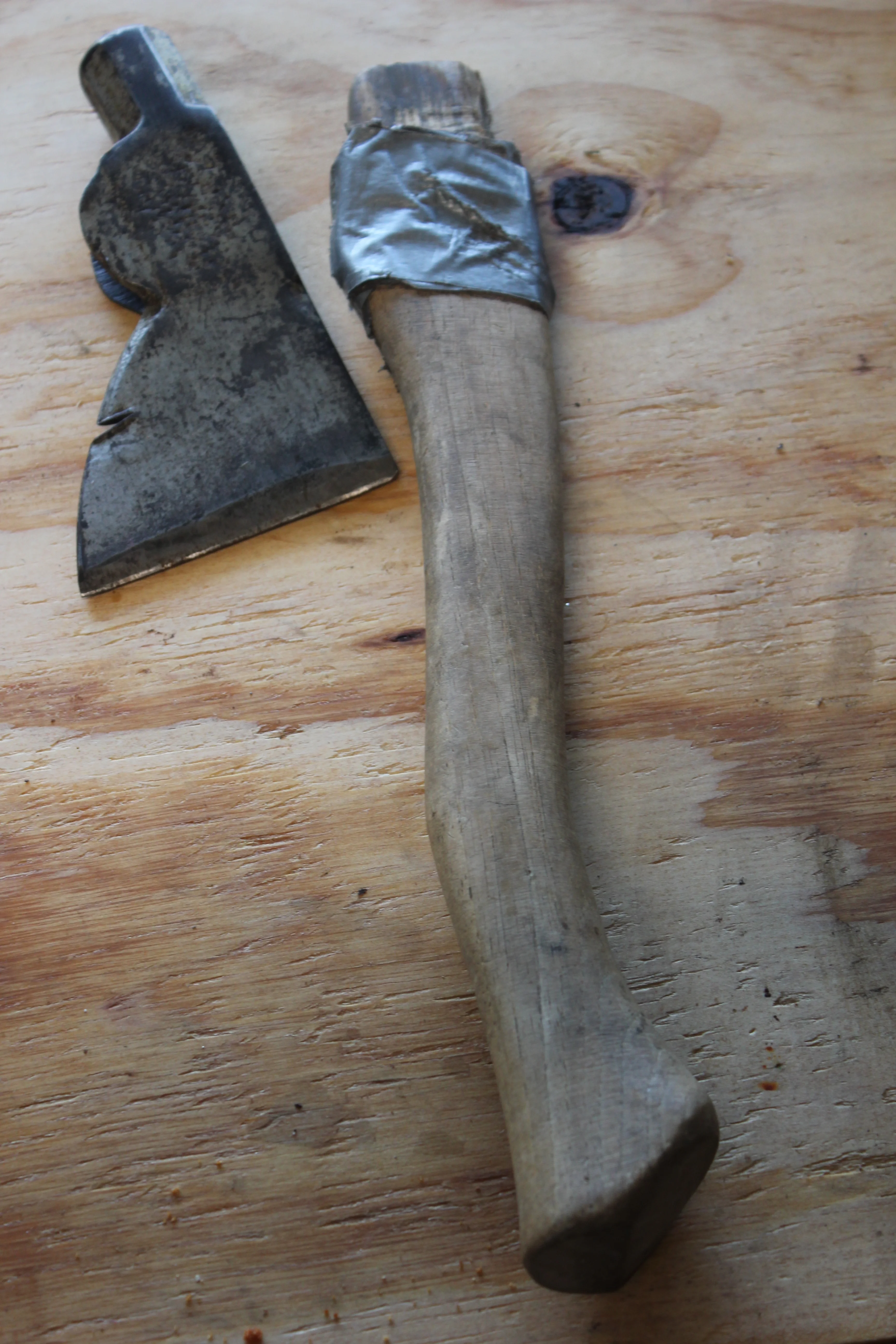 Rusty, dull, chipped edge and a broken handle. It was a sad sight.