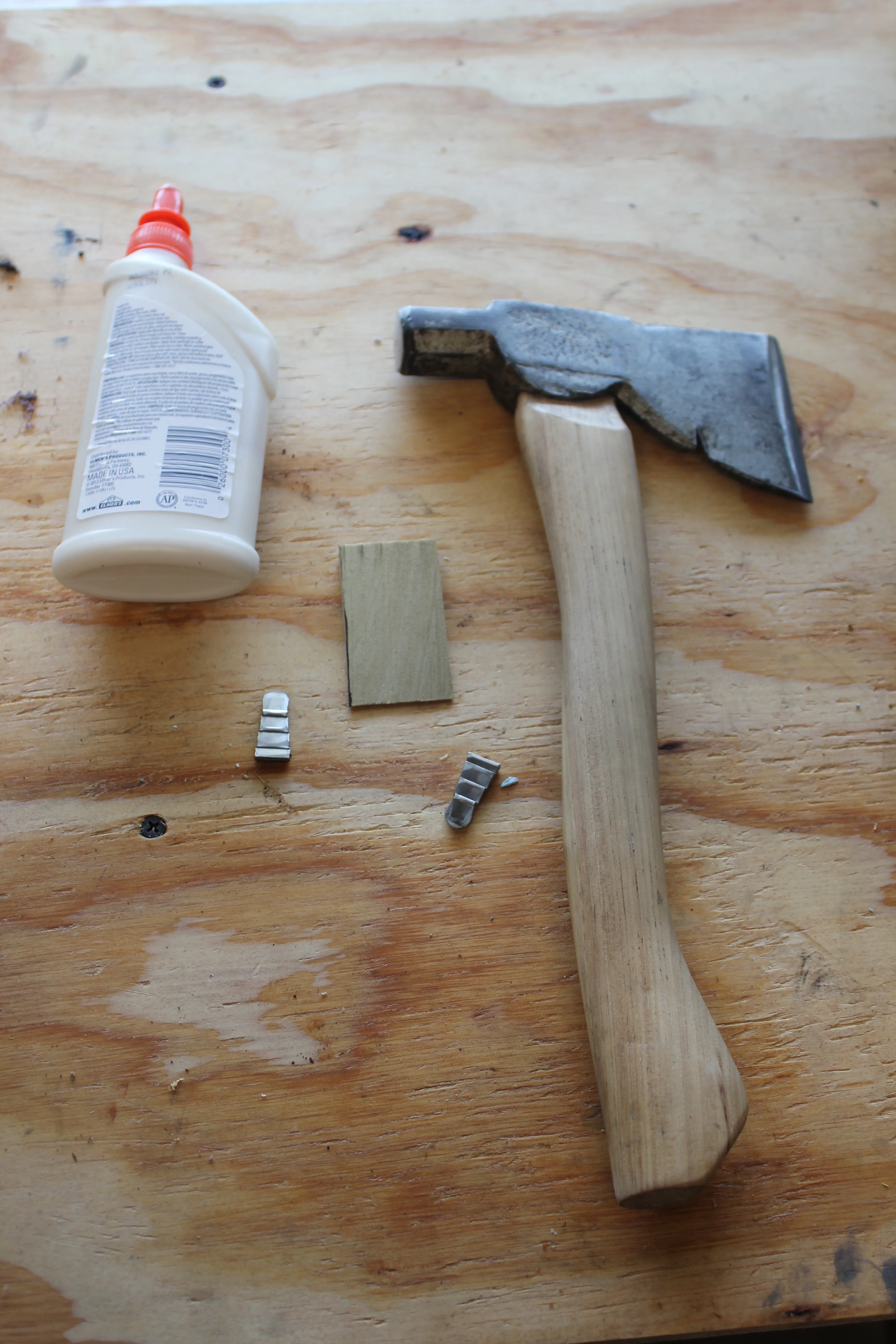 A dab of wood glue on the wedge helps keep it in place while it cures inside the neck once in place. 