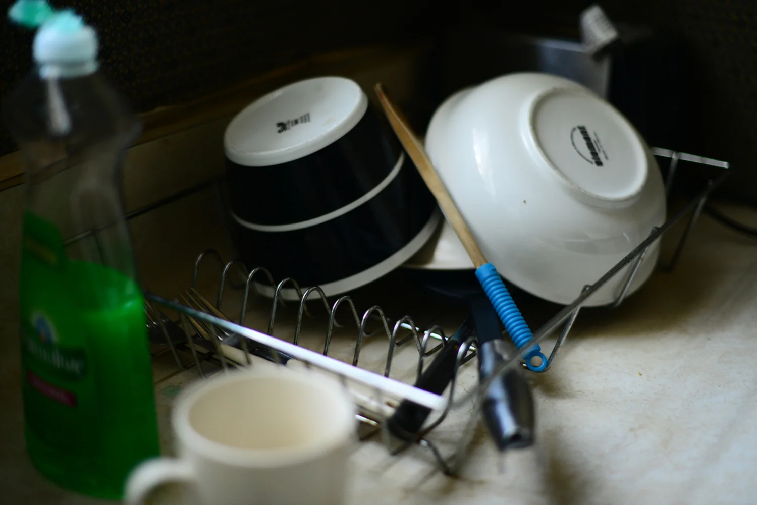 The dishes he'd left to dry.