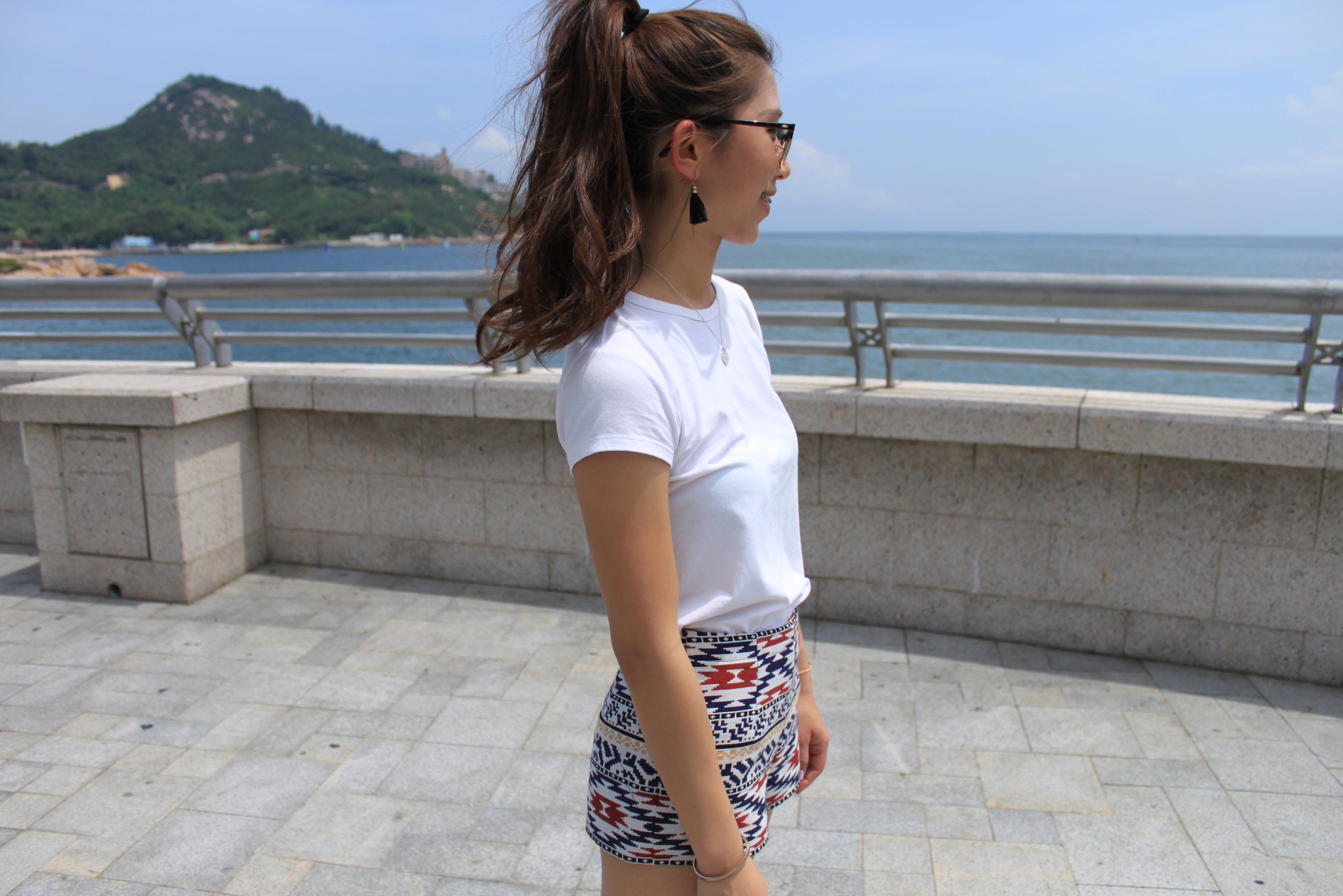 H&M white T-shirt / Zara tribal shorts / Black tassel earrings