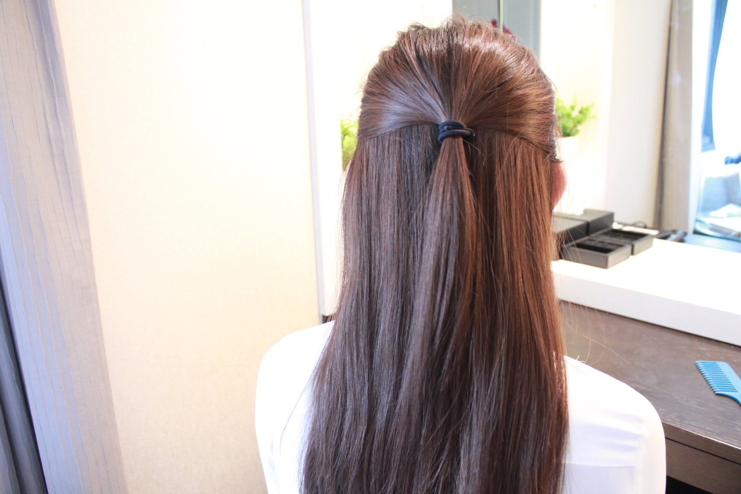 Tie a strand of hair.