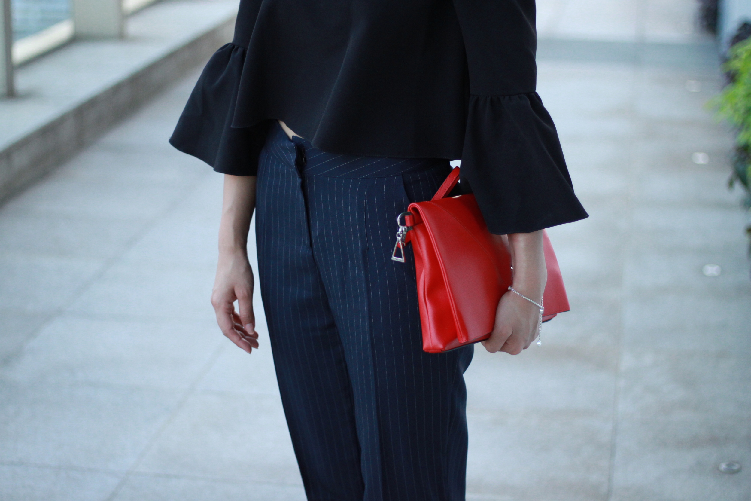 Asos black offshoulder bell-sleeves top / Navy striped cropped pants / Stuart Weitzman On a String maroon pump s / Agnes. b red fold clutch