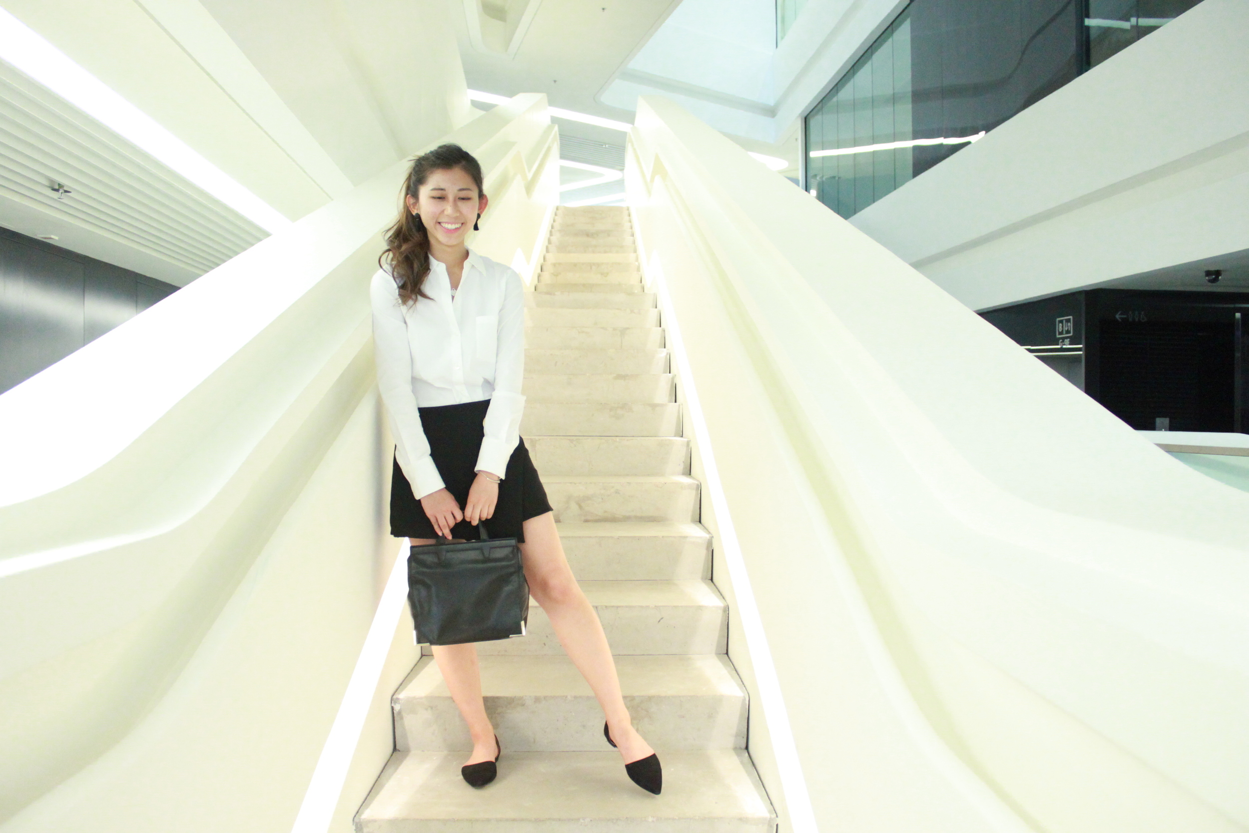 Theory white shirt / Mois studio black uneven skirt / Mango slides / Alexander Wang handbag