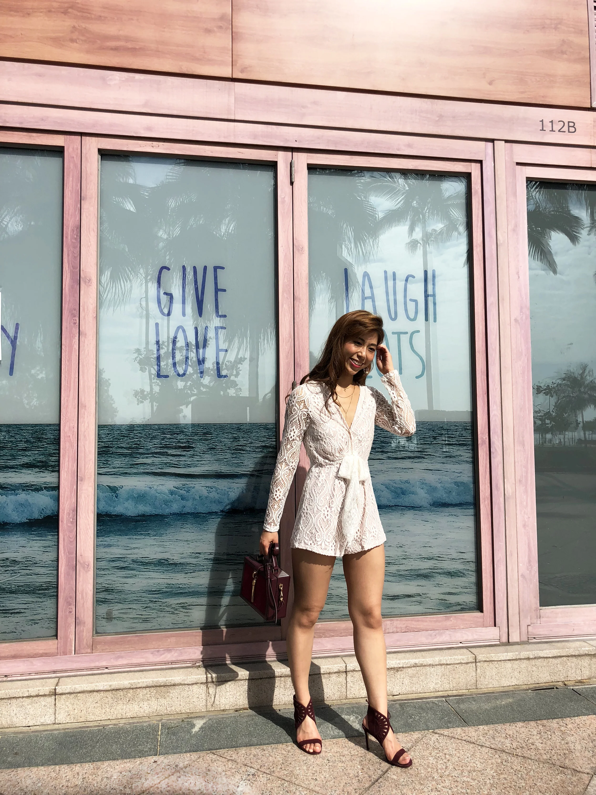 Tobi Everything In Lace Romper / Tory Burch Leyla sandal / Charles & Keith box bag / Forever 21 necklace