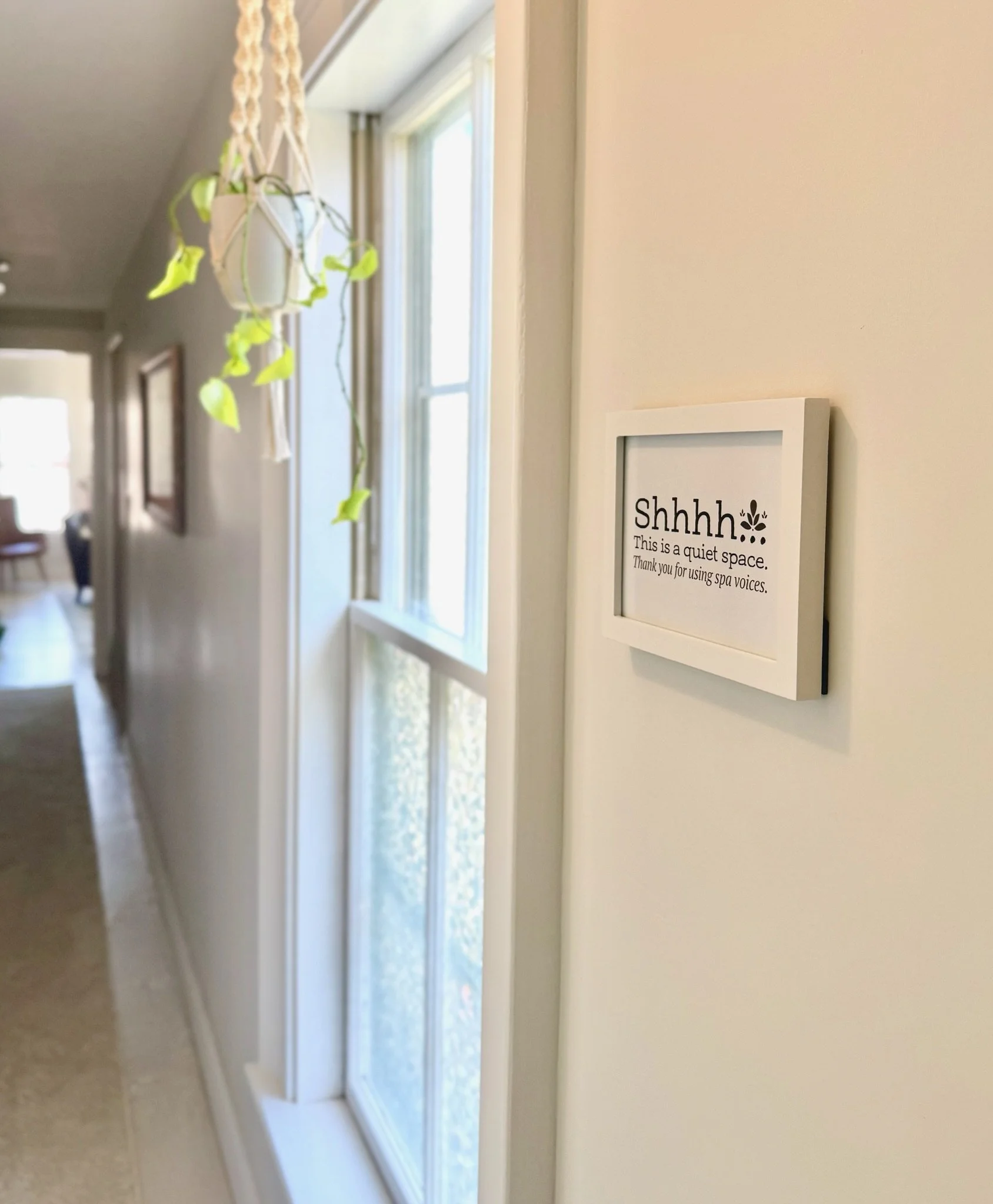 Quiet wellness hallway with natural light inside The Fifth Om in Kennebunk