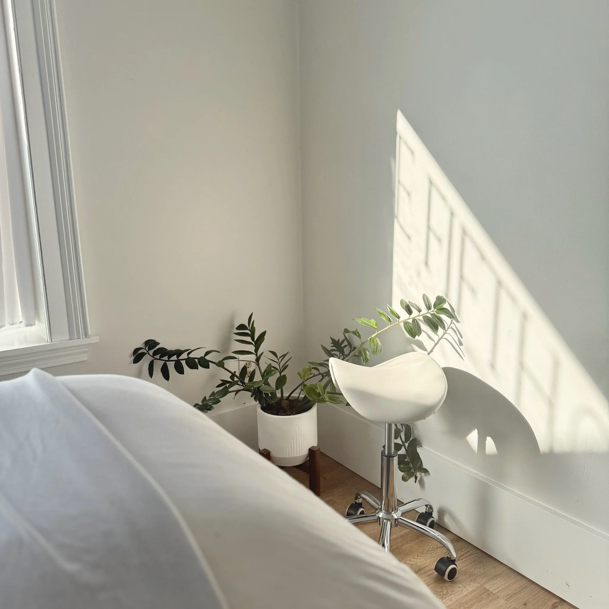 bright corner of spa treatment room at The Fifth Om Kennebunk