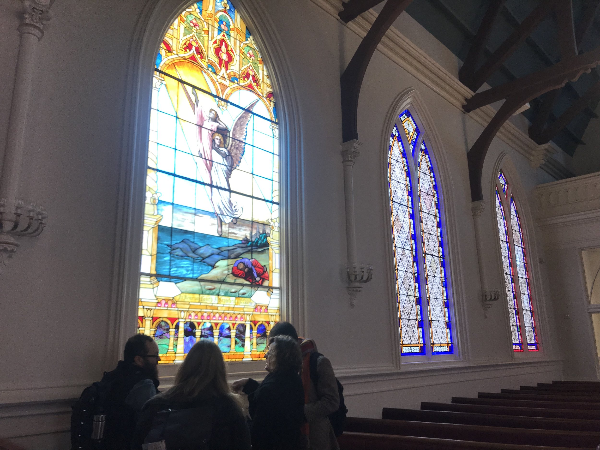  A group engrossed in stained glass detail after Cate Watkinson’s talk 