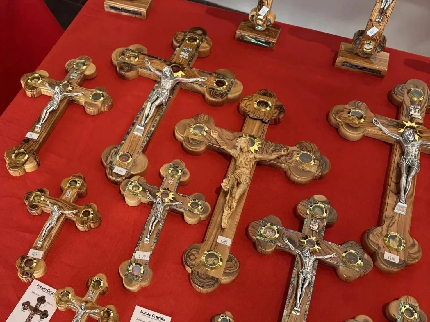 Olive-wood crucifixes and saint figures