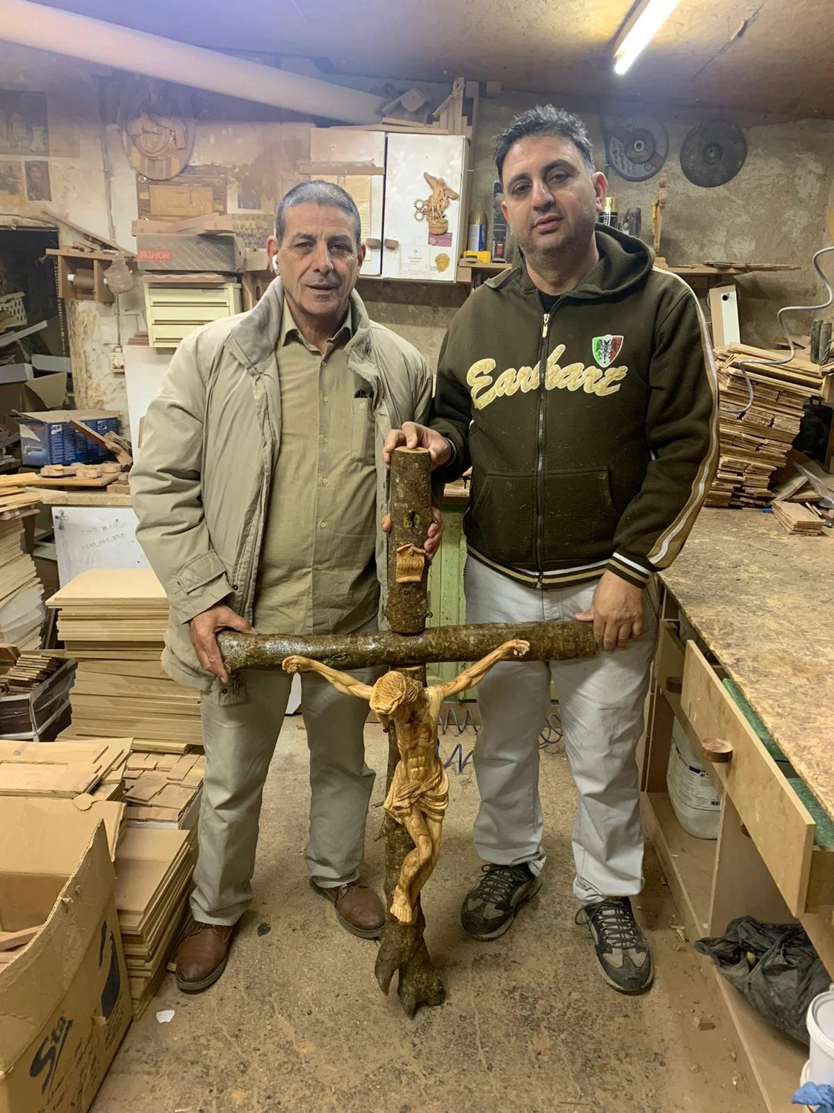 Jeries carving olive wood in his workshop in Beit Sahour