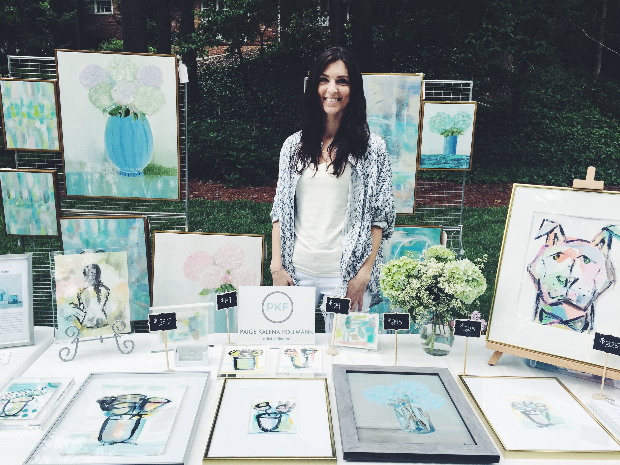 Paige Kalena Follmann with her works of art. 