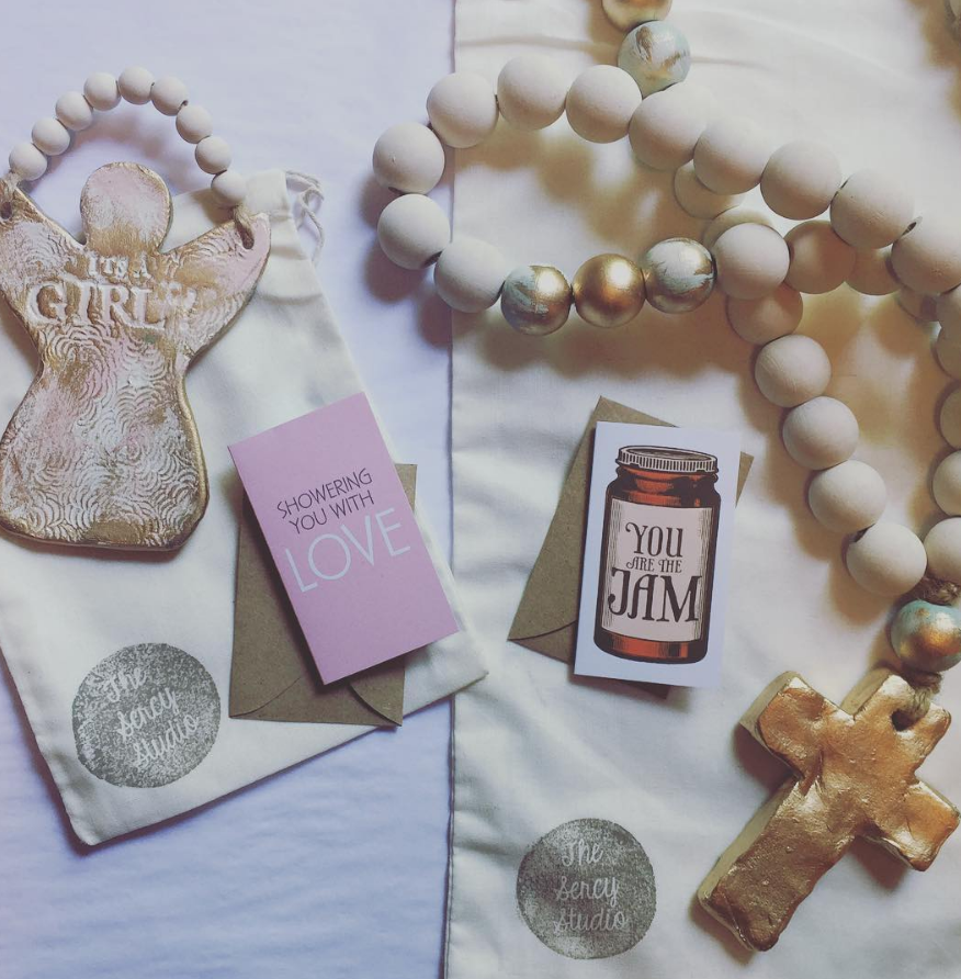 A well-composed shot from The Sercy Studio , featuring Breathless Paper Co. cards as compliments to the beads. 