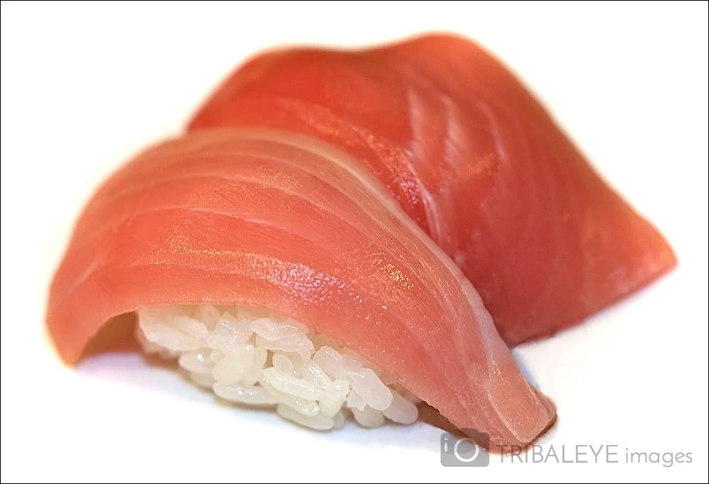 Onigiri. Maguro TUNA. Sushi restaurant, Japan. Cutaway "white background"