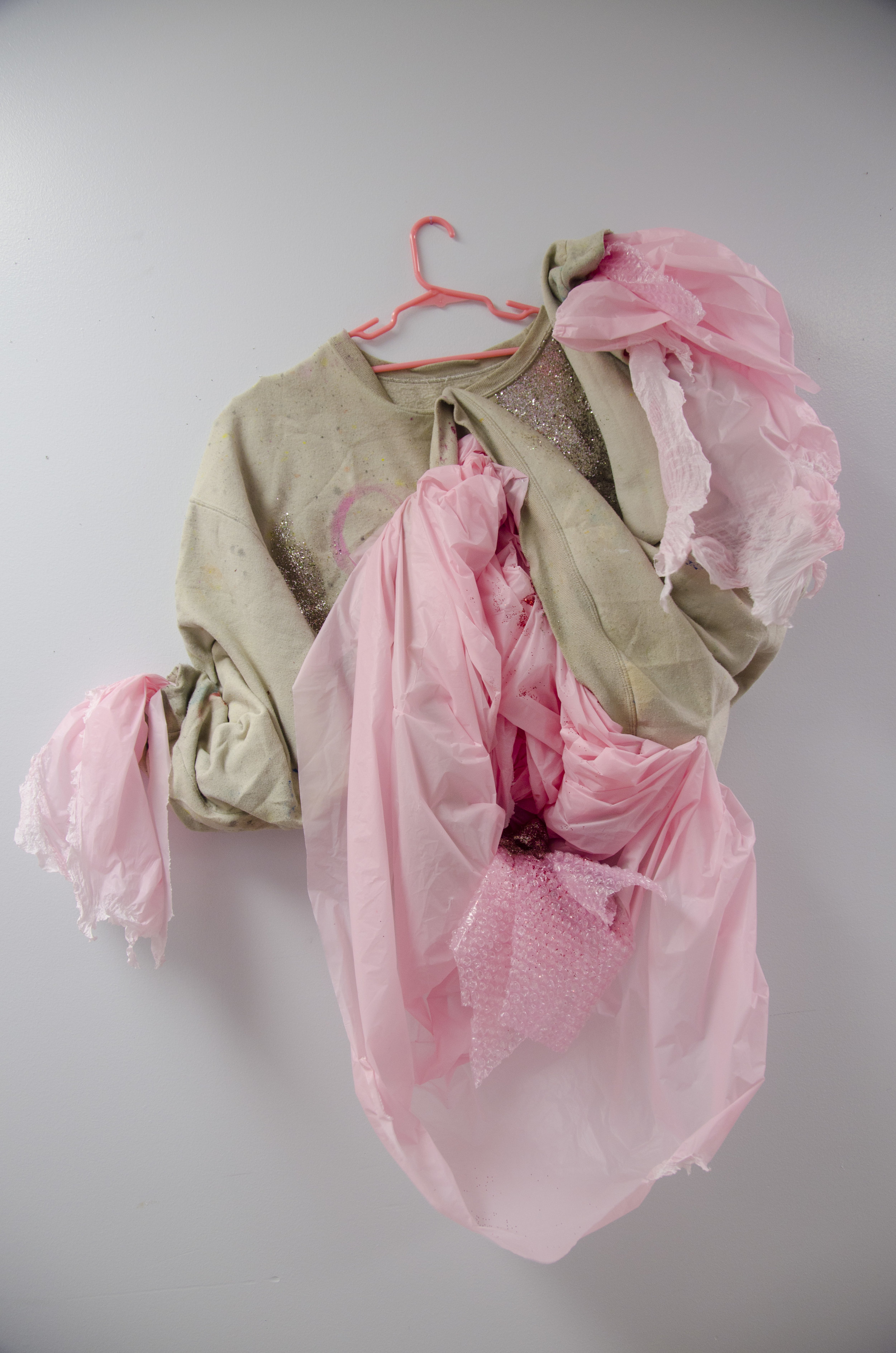   Innards    Sweater, hanger, acrylic, glitter, plaster, tablecloth, and bubblewrap  2016    