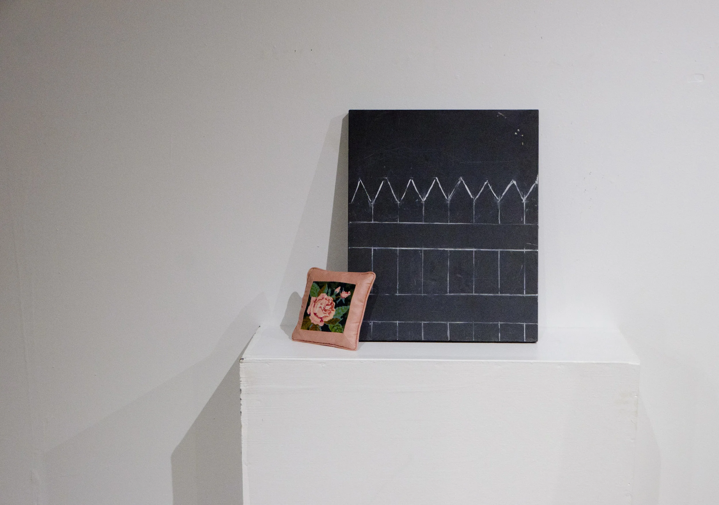   Soft spot    2018   Chalk on slate, and found pillow    