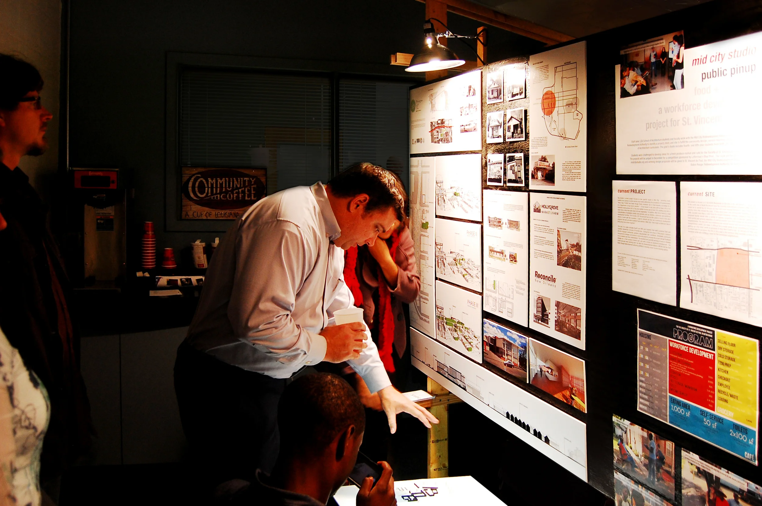 008_Letterman's owner Steve Perret talks to students about their projects at White Light Night.jpg