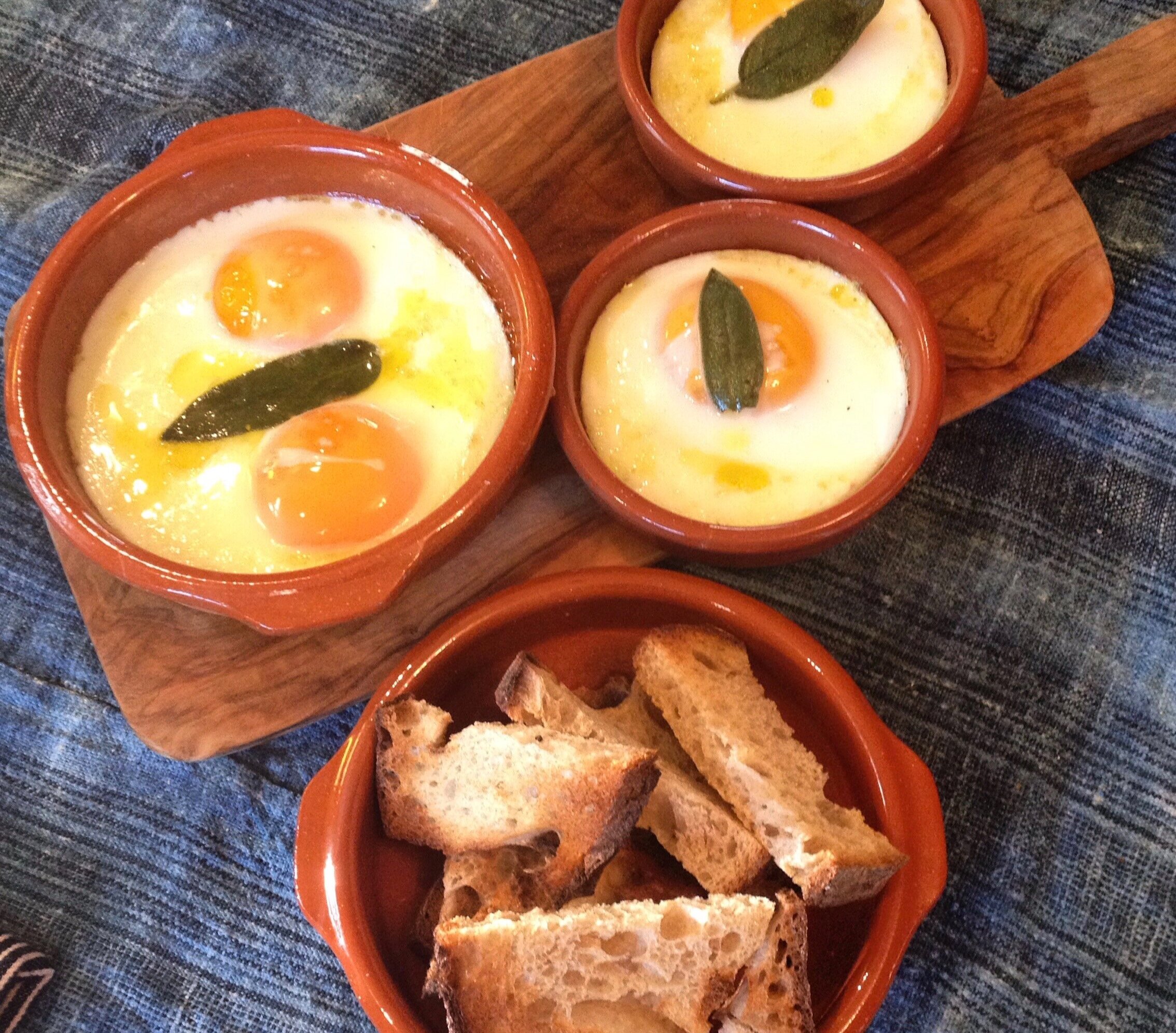 Baked eggs with toast soldiers