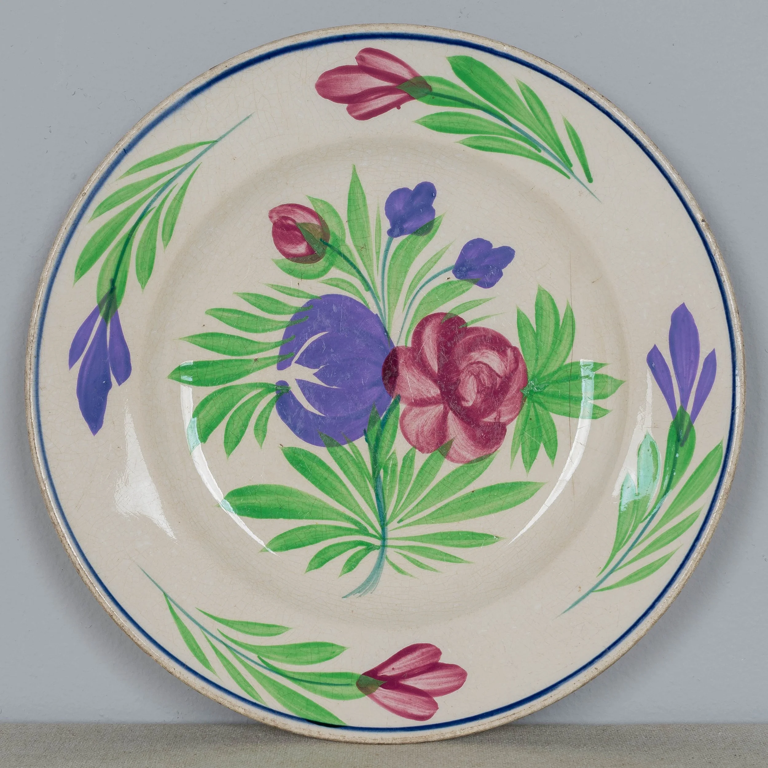 A set of three 19th Century French glazed faience plates made by Sarreguemines