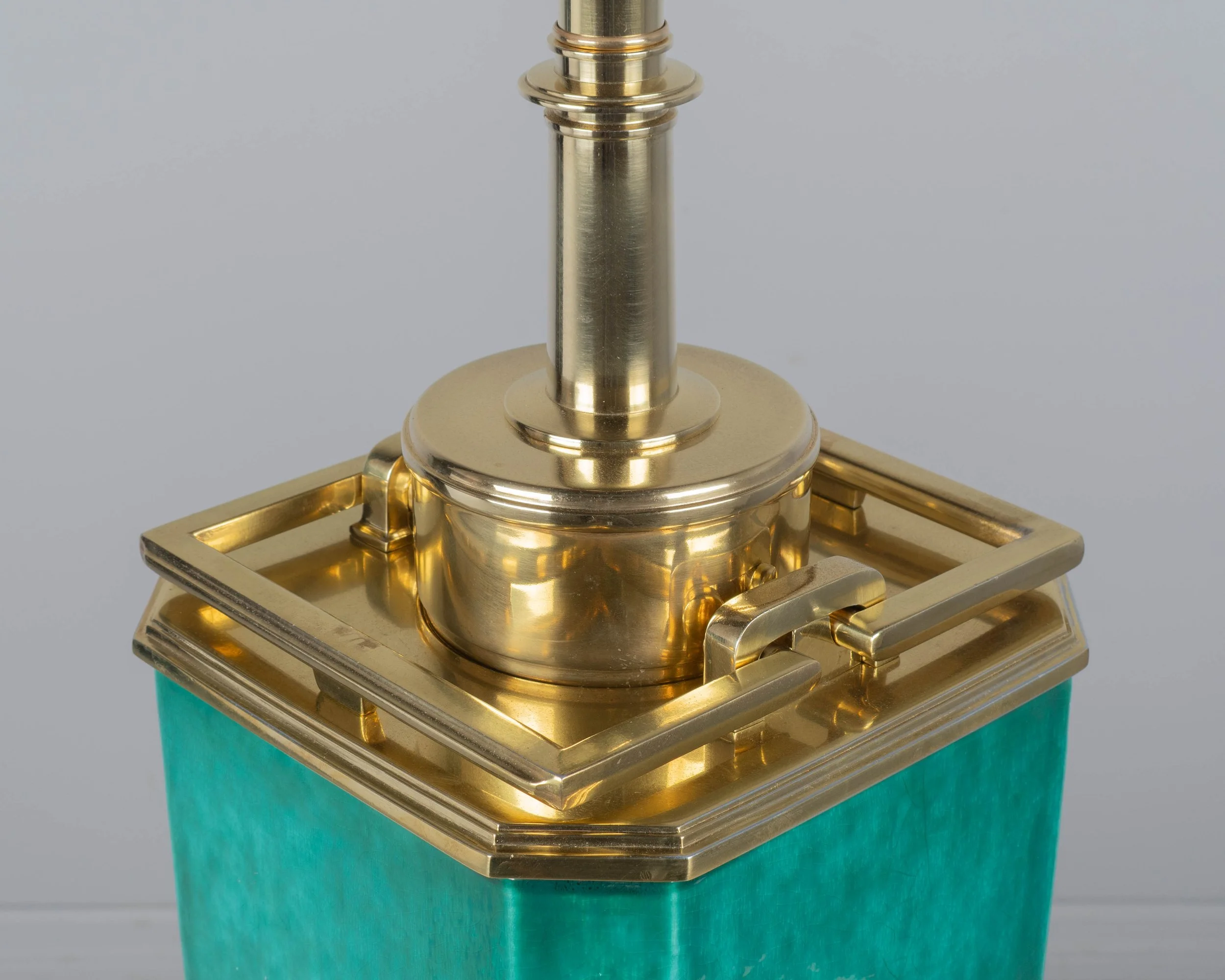 A Mid Century table lamp by Edwin Cole for Stiffel. Large octagonal deeply saturated heavy glazed ceramic body in beautiful shade of turquoise,