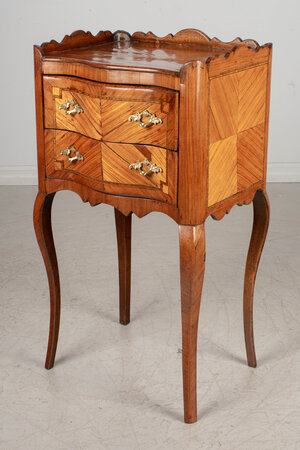 A pair of reproduction Louis XV style oval marquetry inlaid bedside chests,  width 47cm, depth 36cm