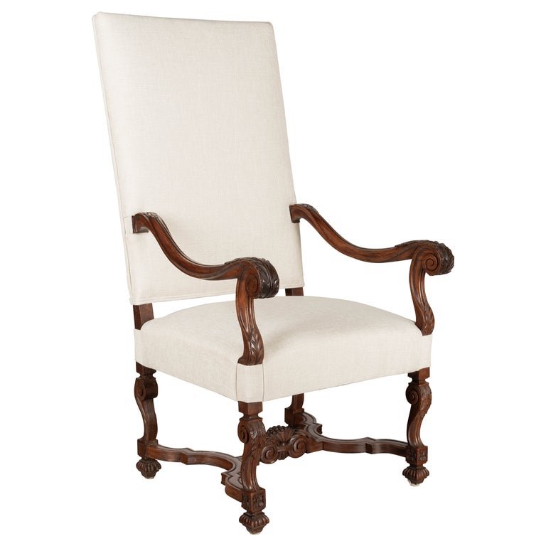 Antique French Louis XV styled walnut armchair.