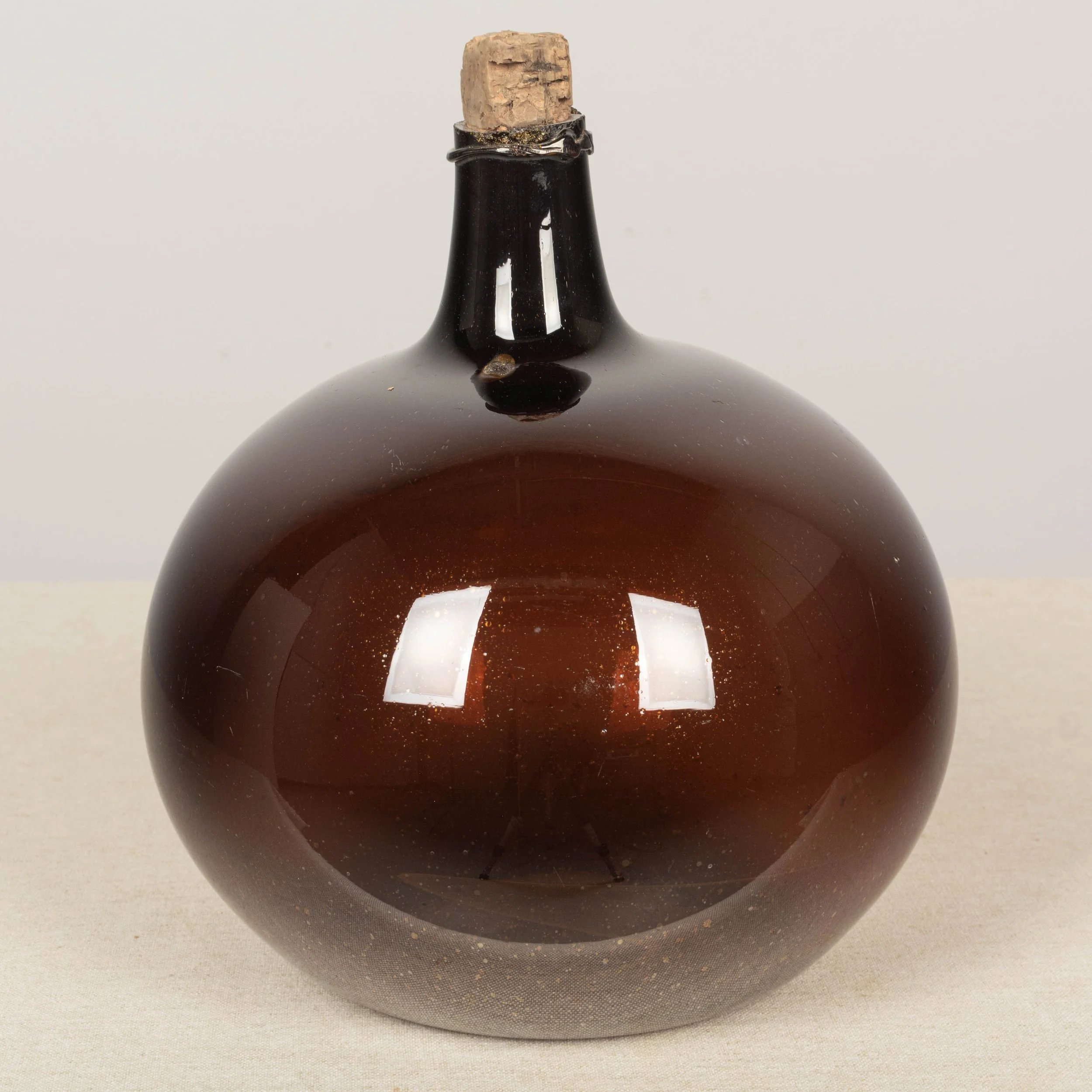 19th Century French Small Amber Glass Demijohn Bottle