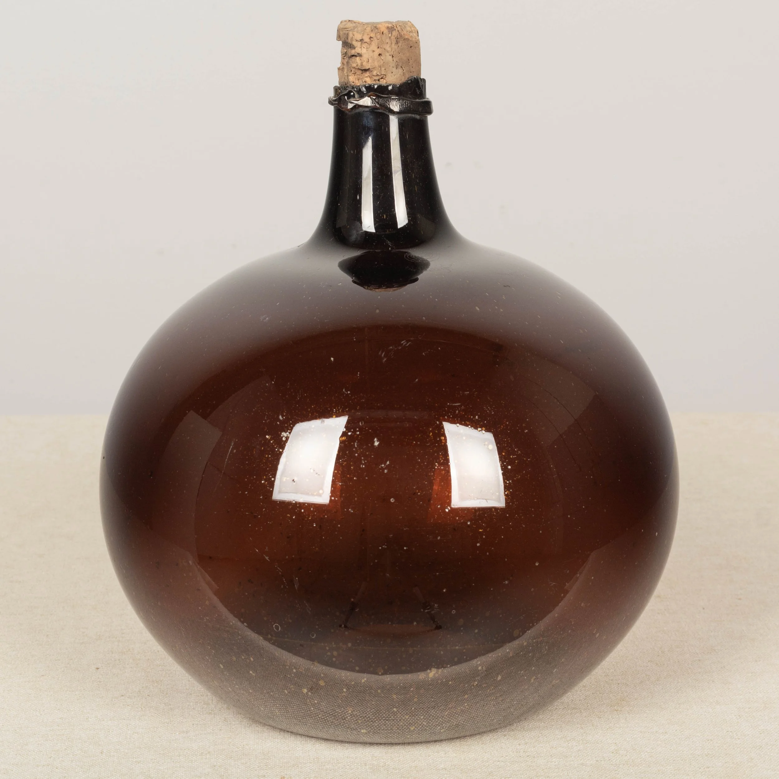19th Century French Small Amber Glass Demijohn Bottle