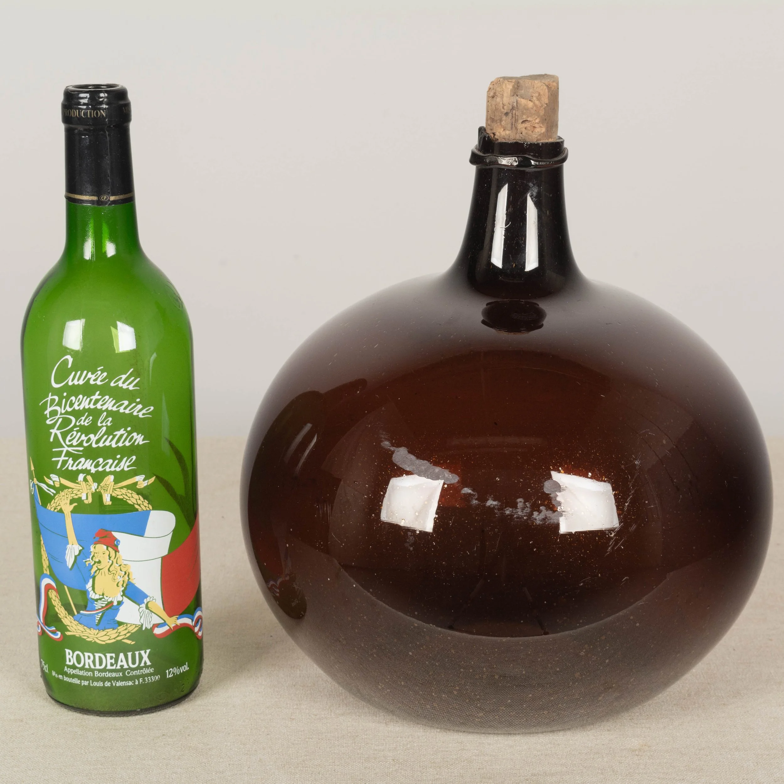 19th Century French Small Amber Glass Demijohn Bottle